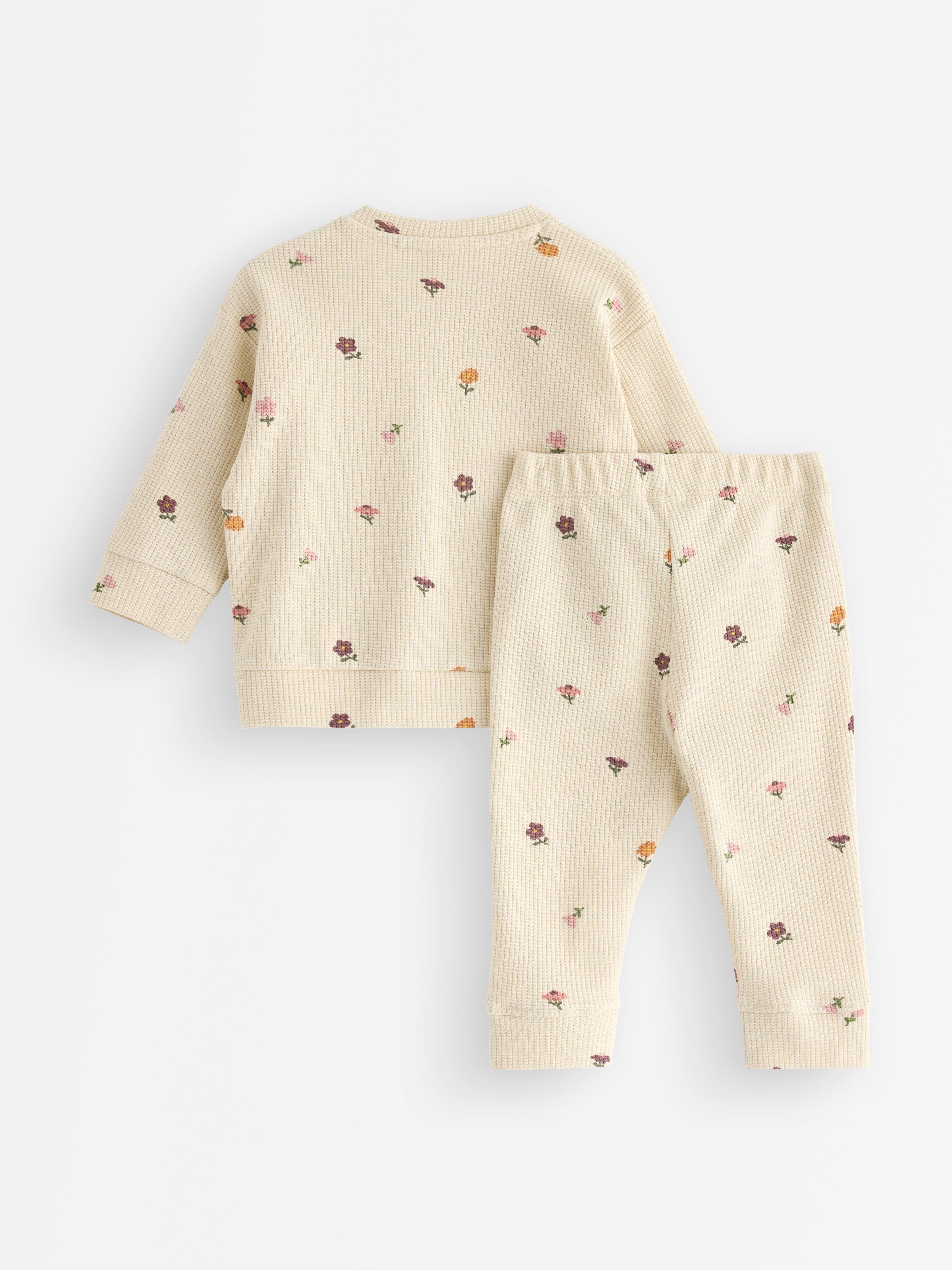 Conjunto - blusa de moletom e calça bege claro
