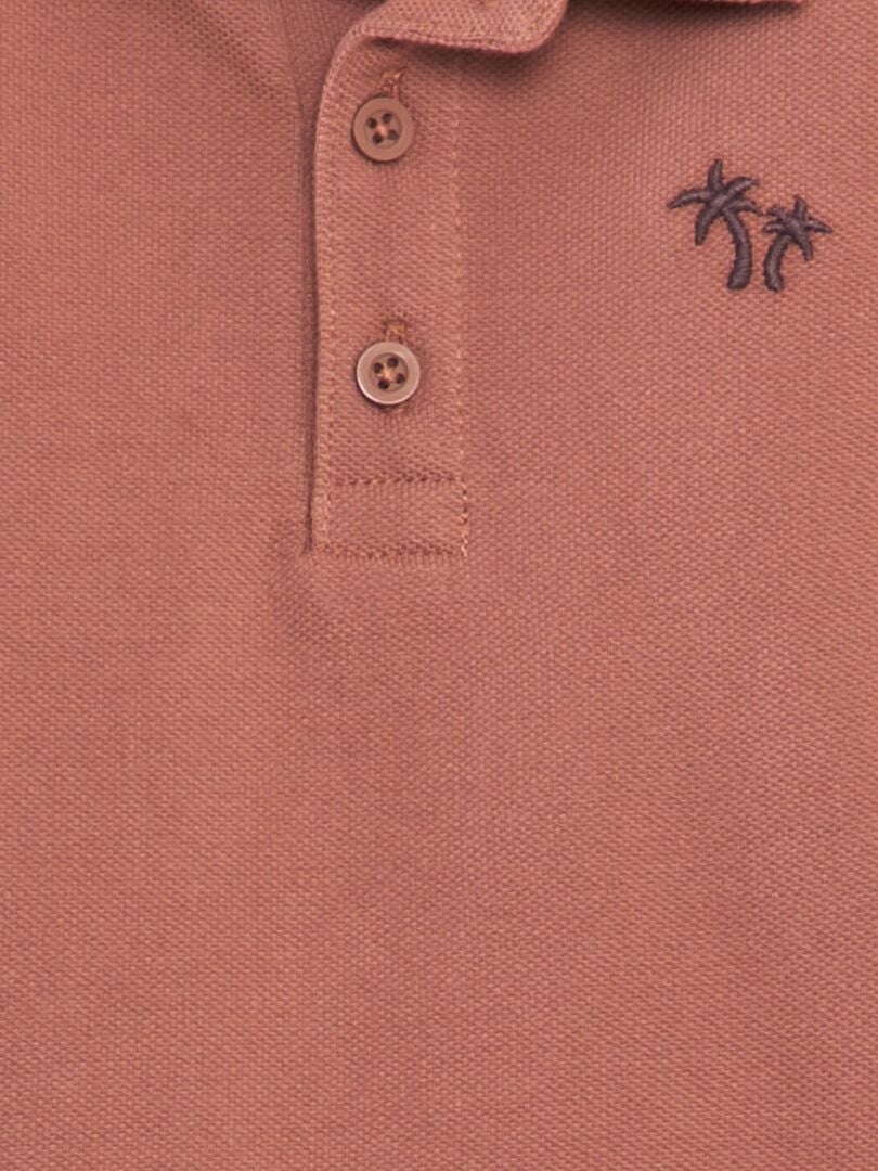 Camisa polo de algodão piqué com estampa de palmeiras - VERMELHA