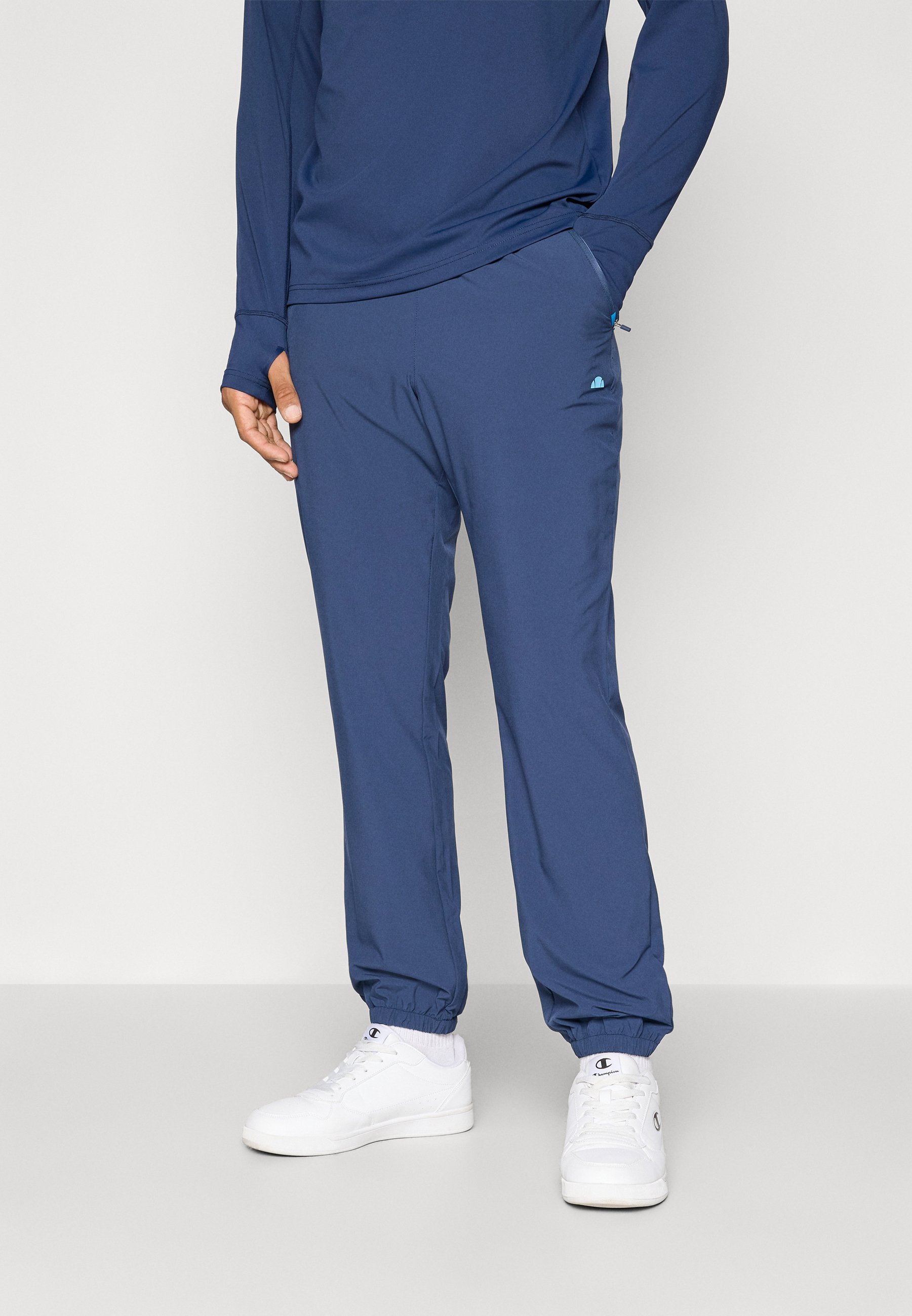 Ellesse BENEVIOS TRACK PANT - Spodnji del trenirke - mornarsko modra