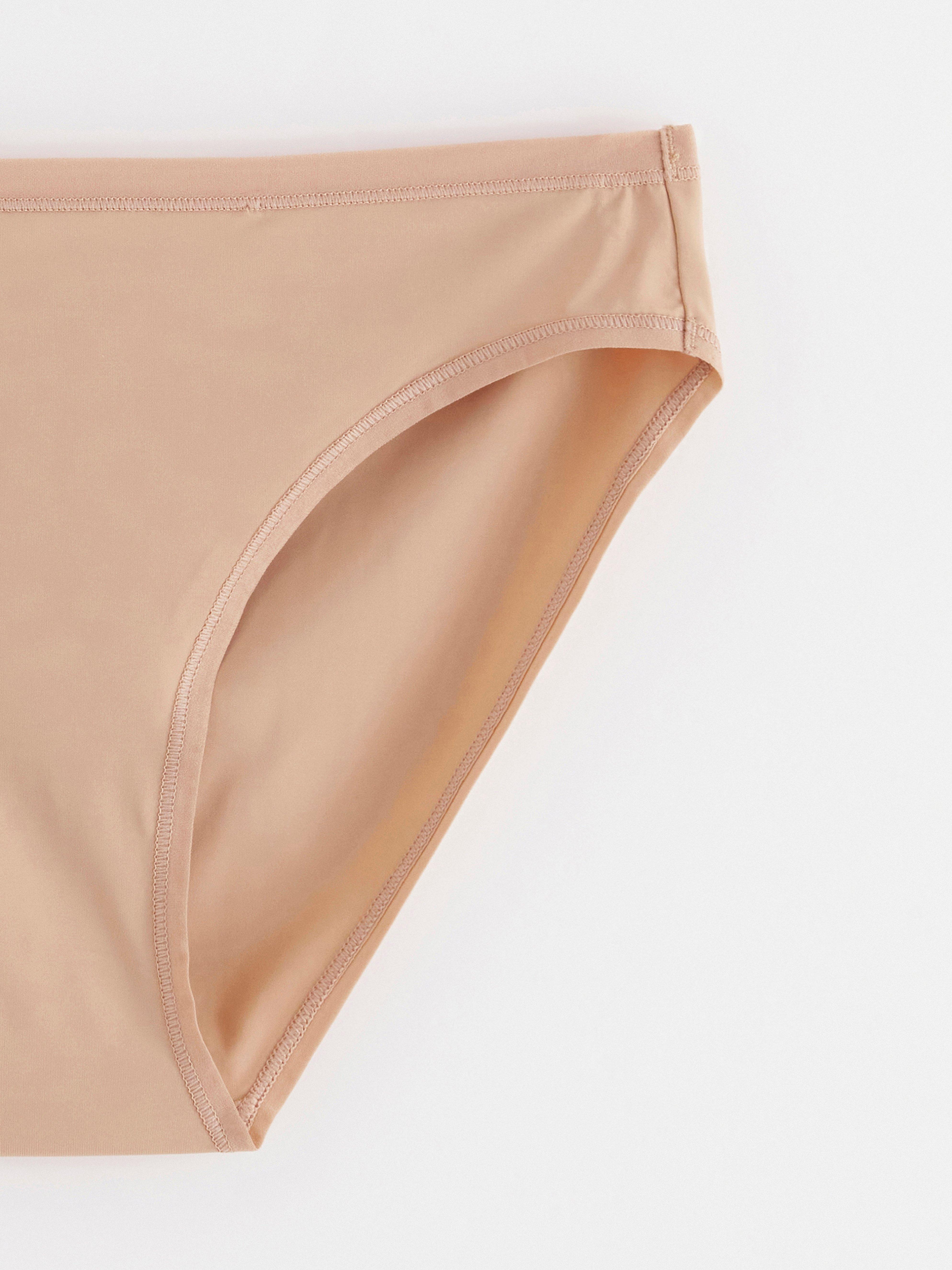 Braguita de bikini de cintura normal, color beige.