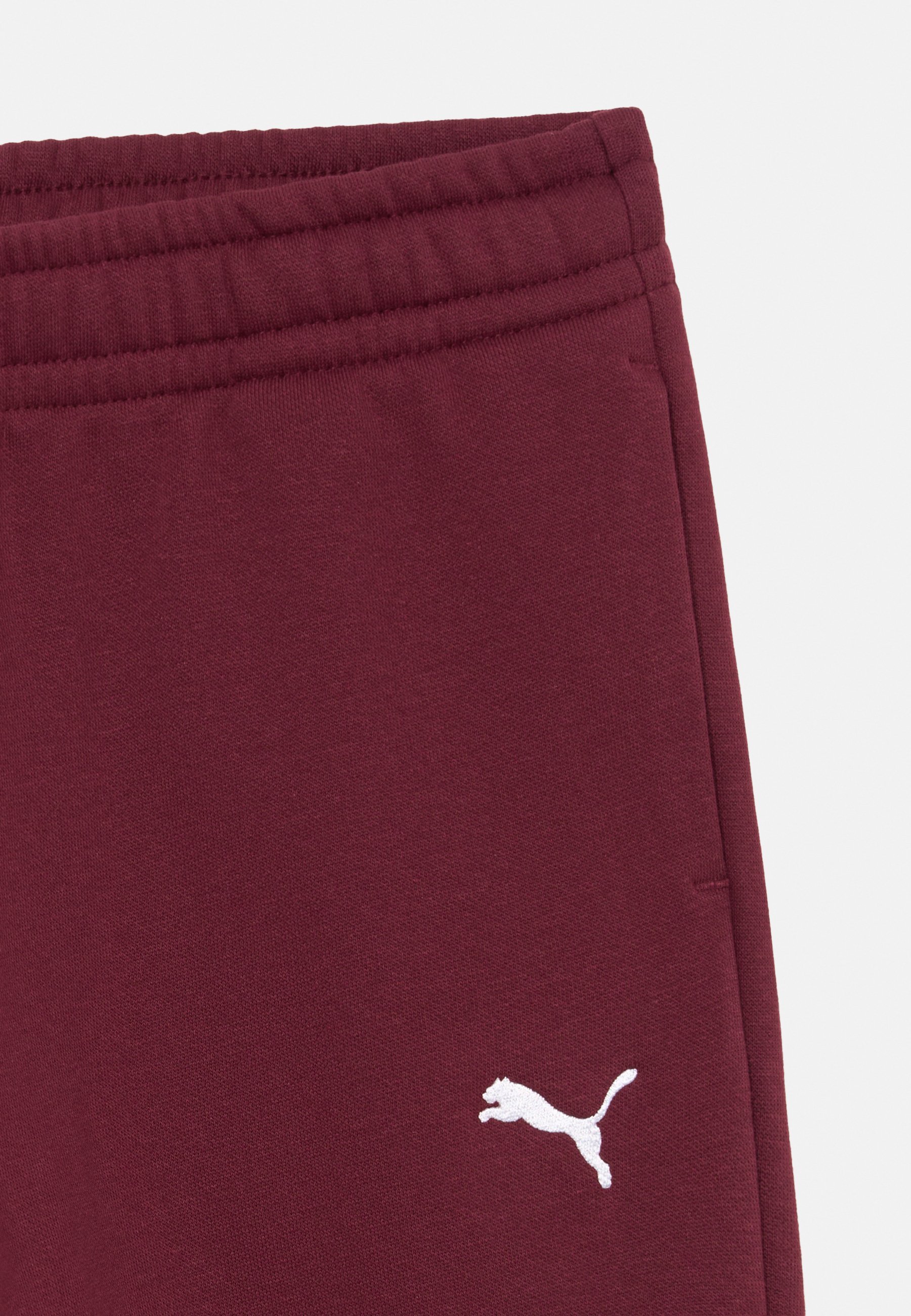 Puma UNISEX - Spodnji del trenirke - rubinasto bleščeč