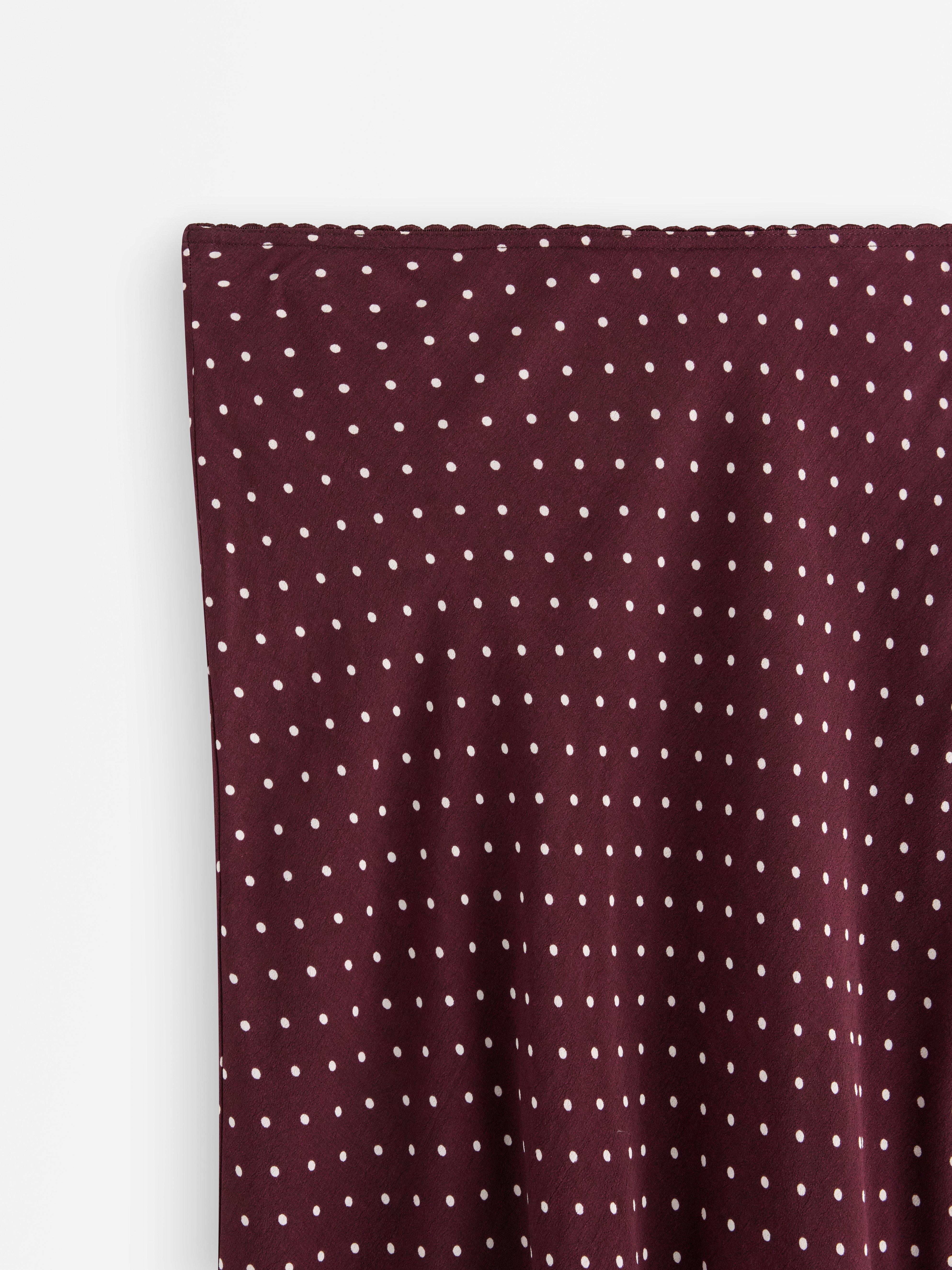 Falda midi color lila oscuro