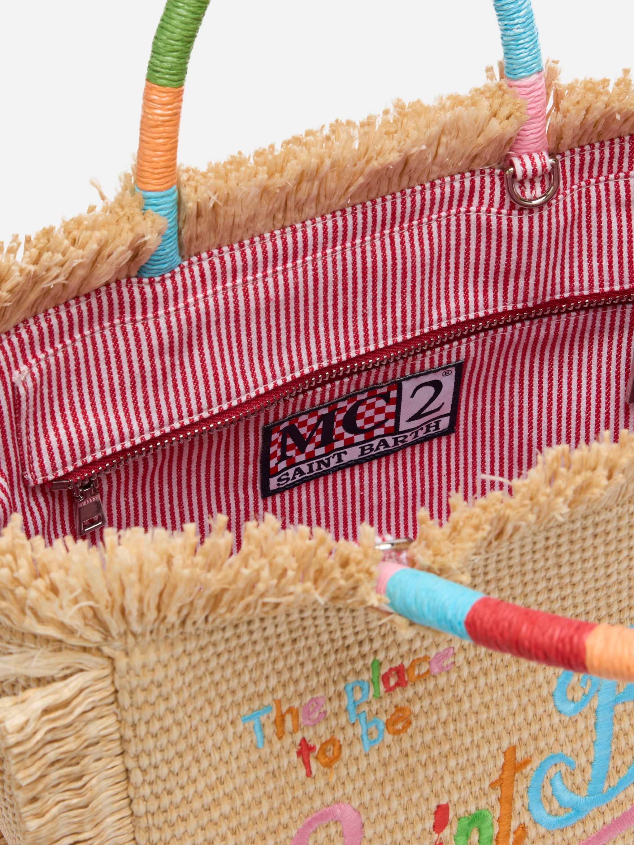 Colette tas met stro-effect en veelkleurig geborduurd logo.
