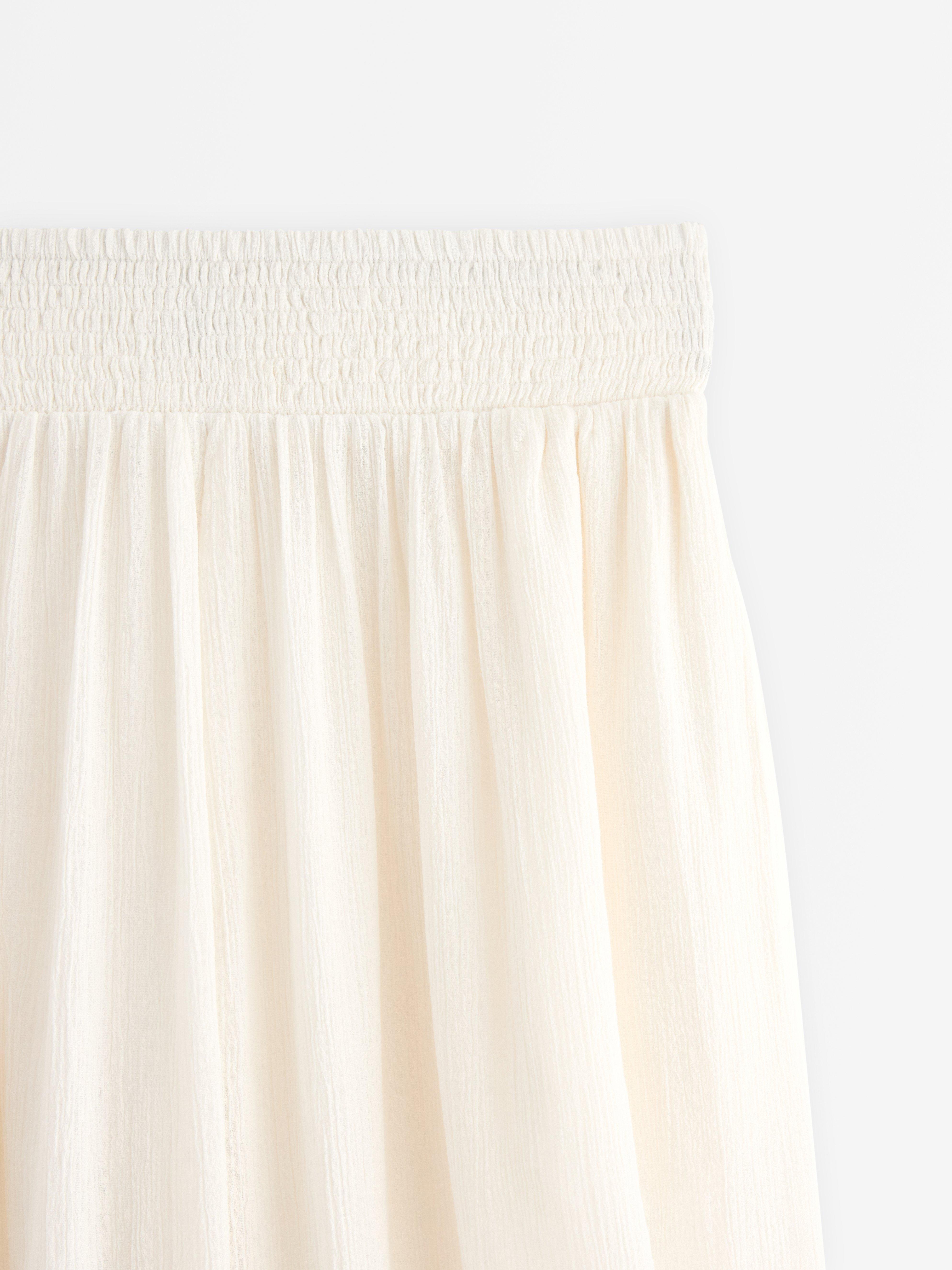 Pantalones anchos cortos blancos