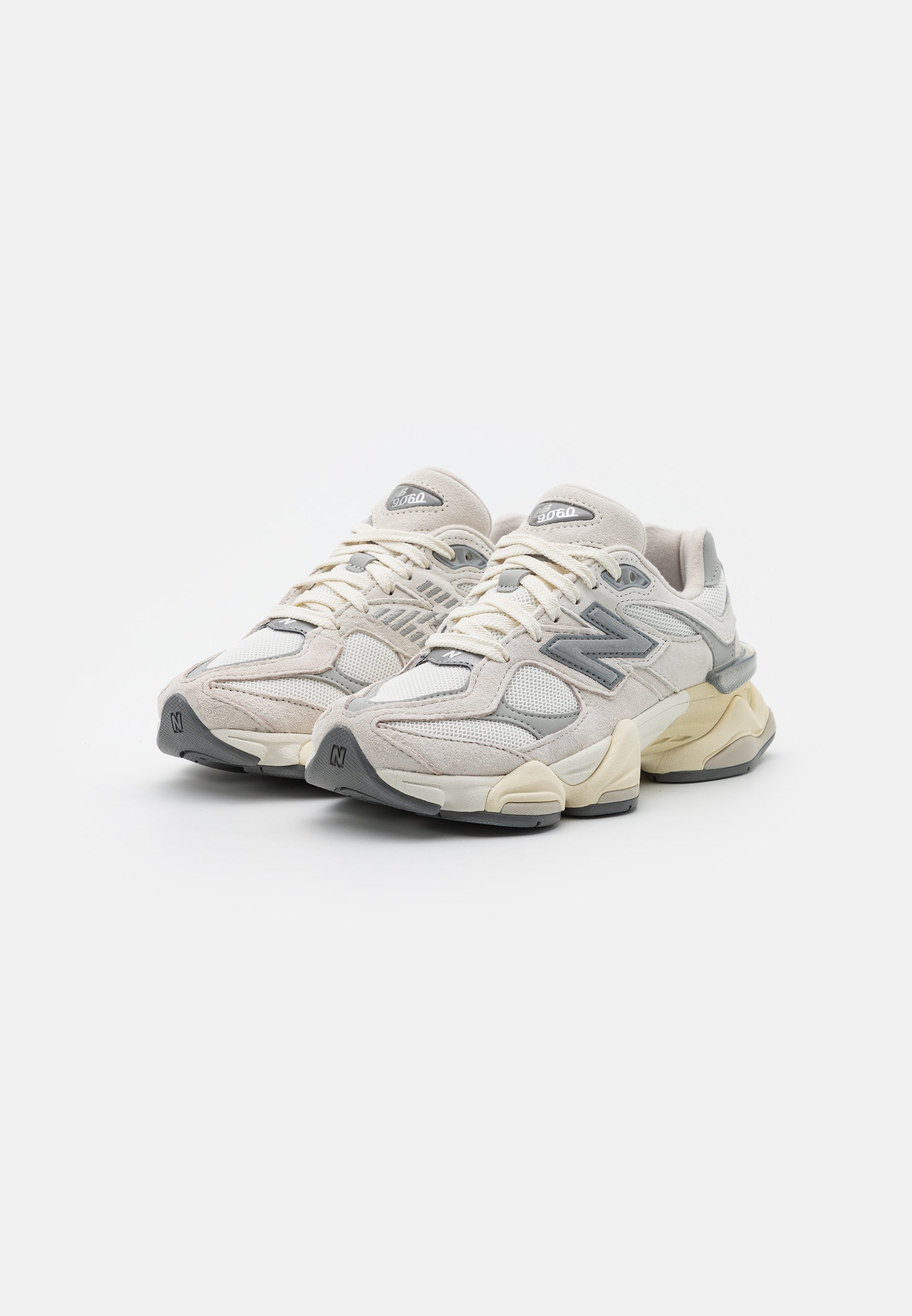Baskets New Balance U9060 unisexes blanches