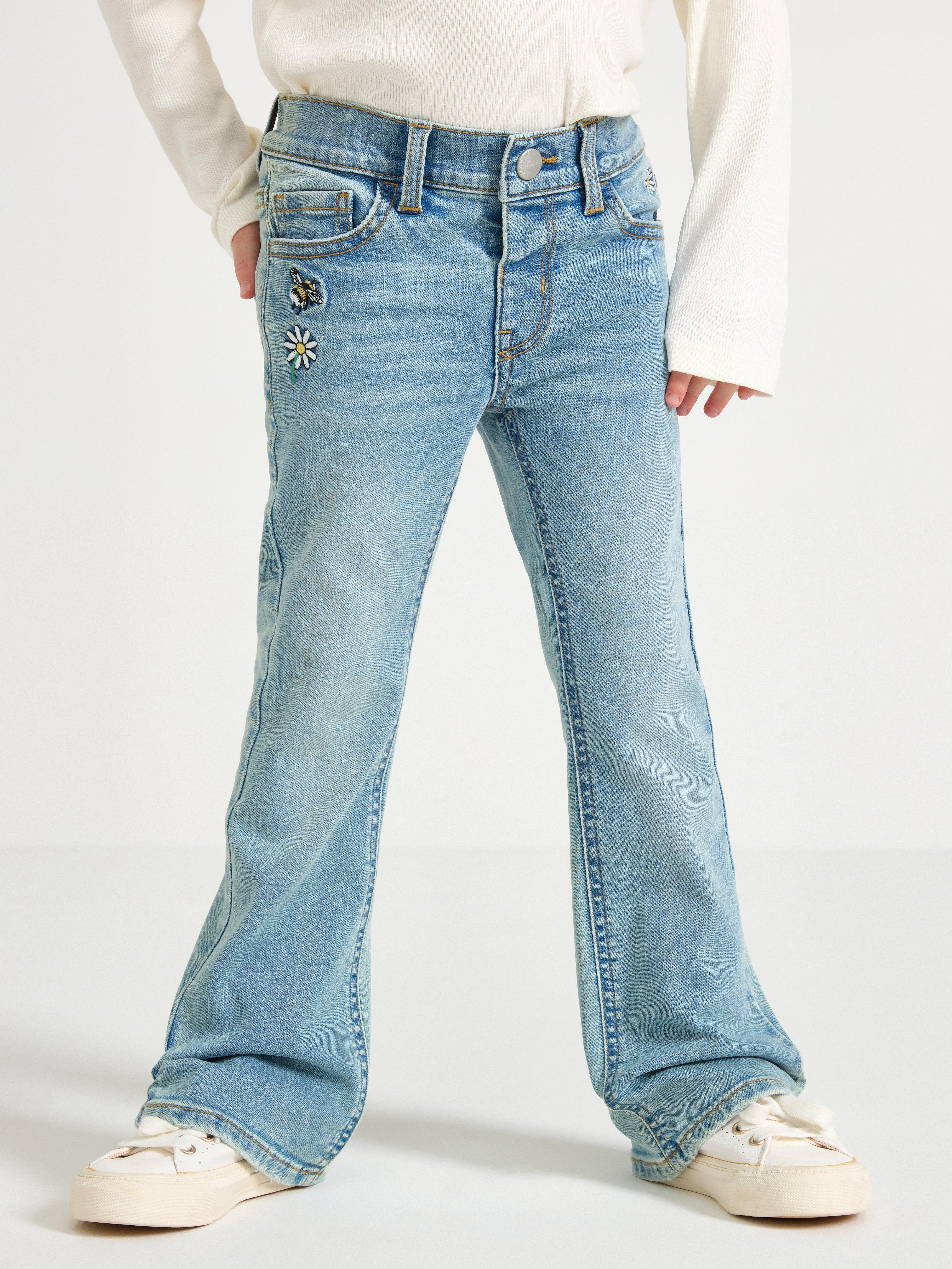 FREJA Jeans acampanados con bordados, mezclilla clara