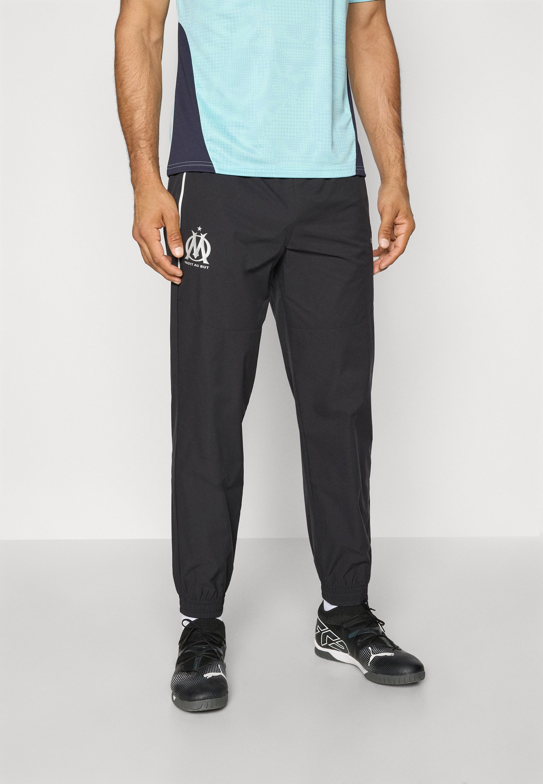 Puma OM broek - Clubkleding - zwart/zilverkleurig