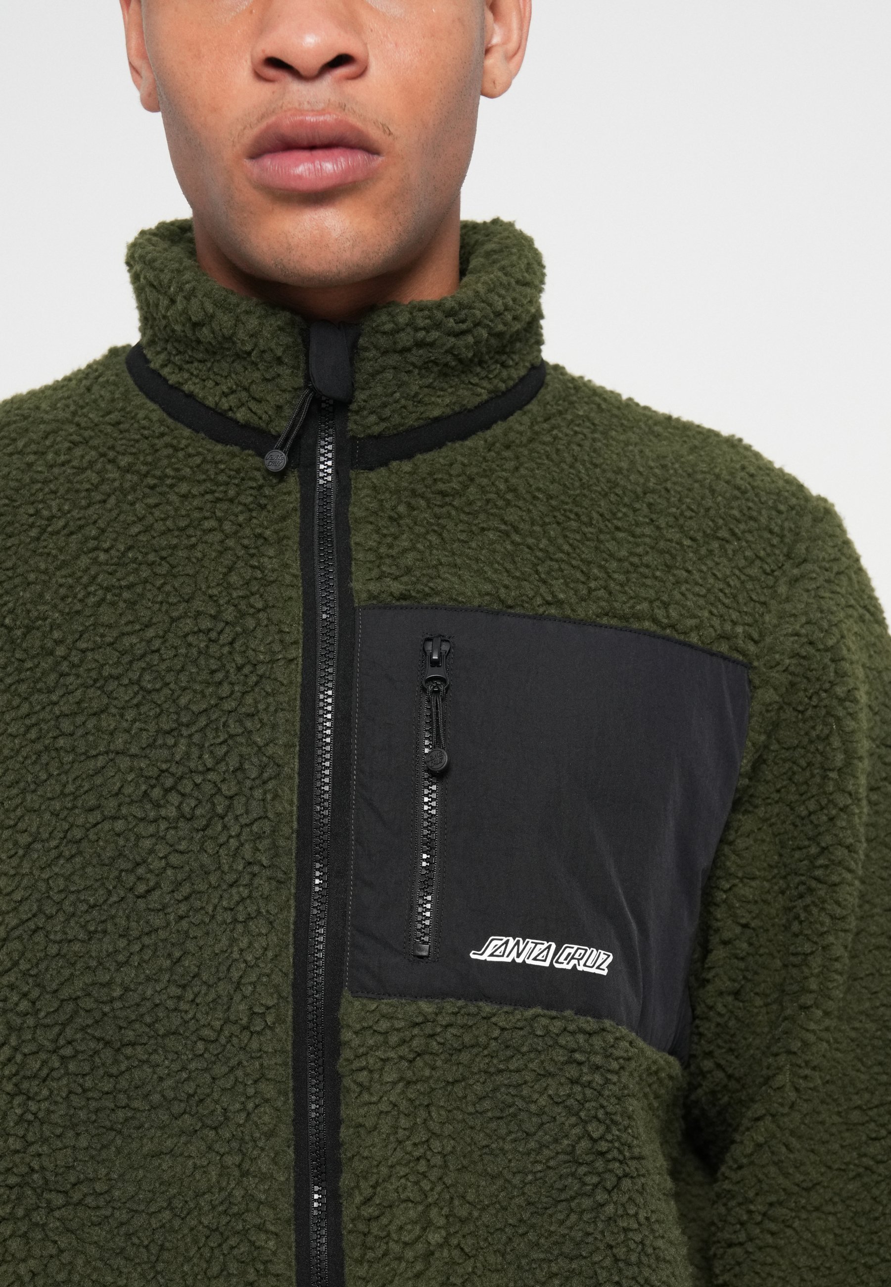 Santa Cruz fleecejassen en pullovers