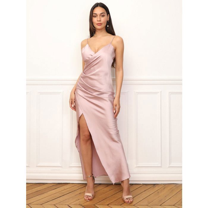 Long satin wrap dress with side ruching. Features thin, adjustable straps and a front slit. Women's Dresses