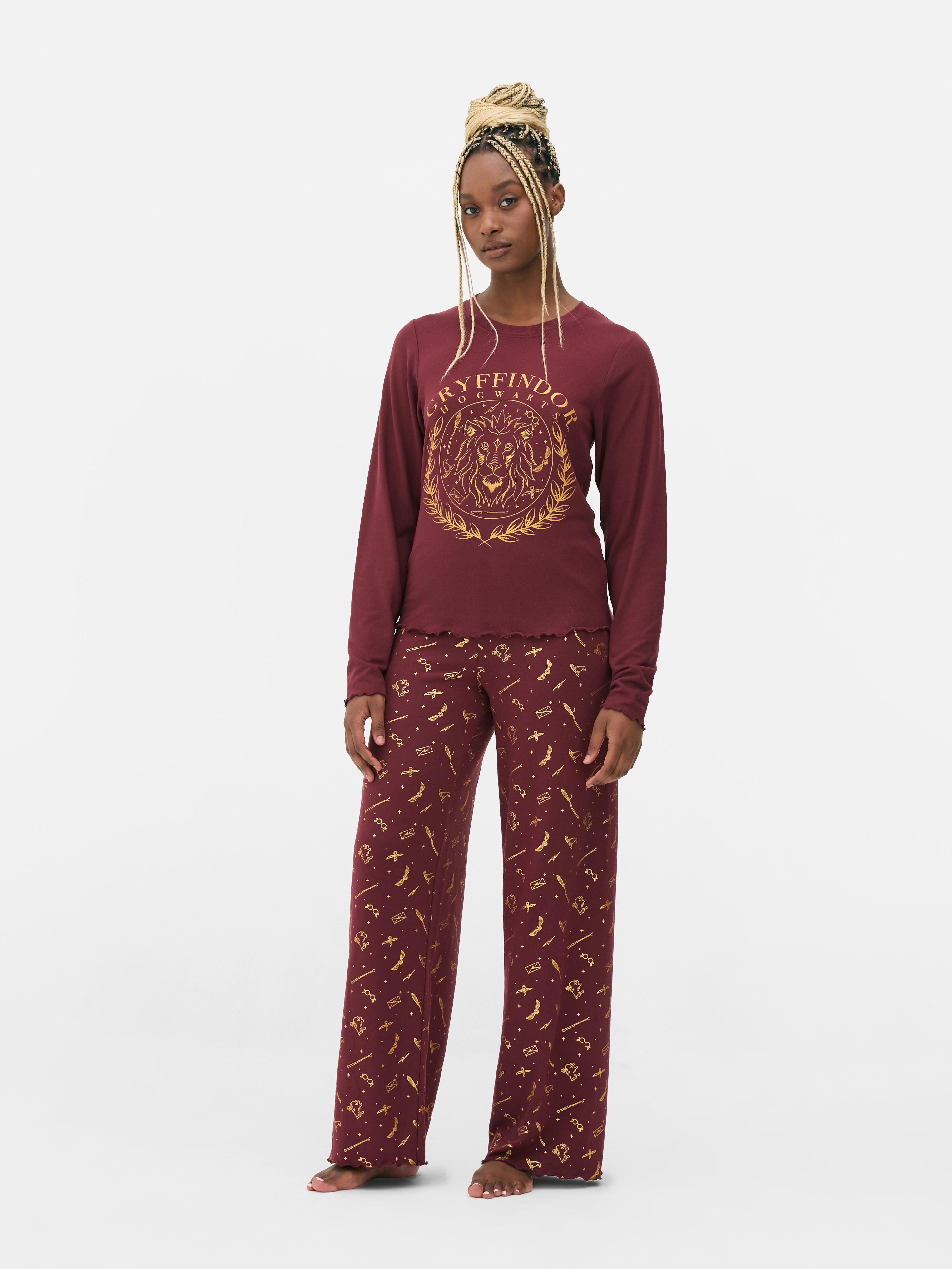Pijamale Harry Potter™ cu Casele de la Hogwarts Pijamale cu top cu mânecă lungă și pantaloni cu casele de la Hogwarts