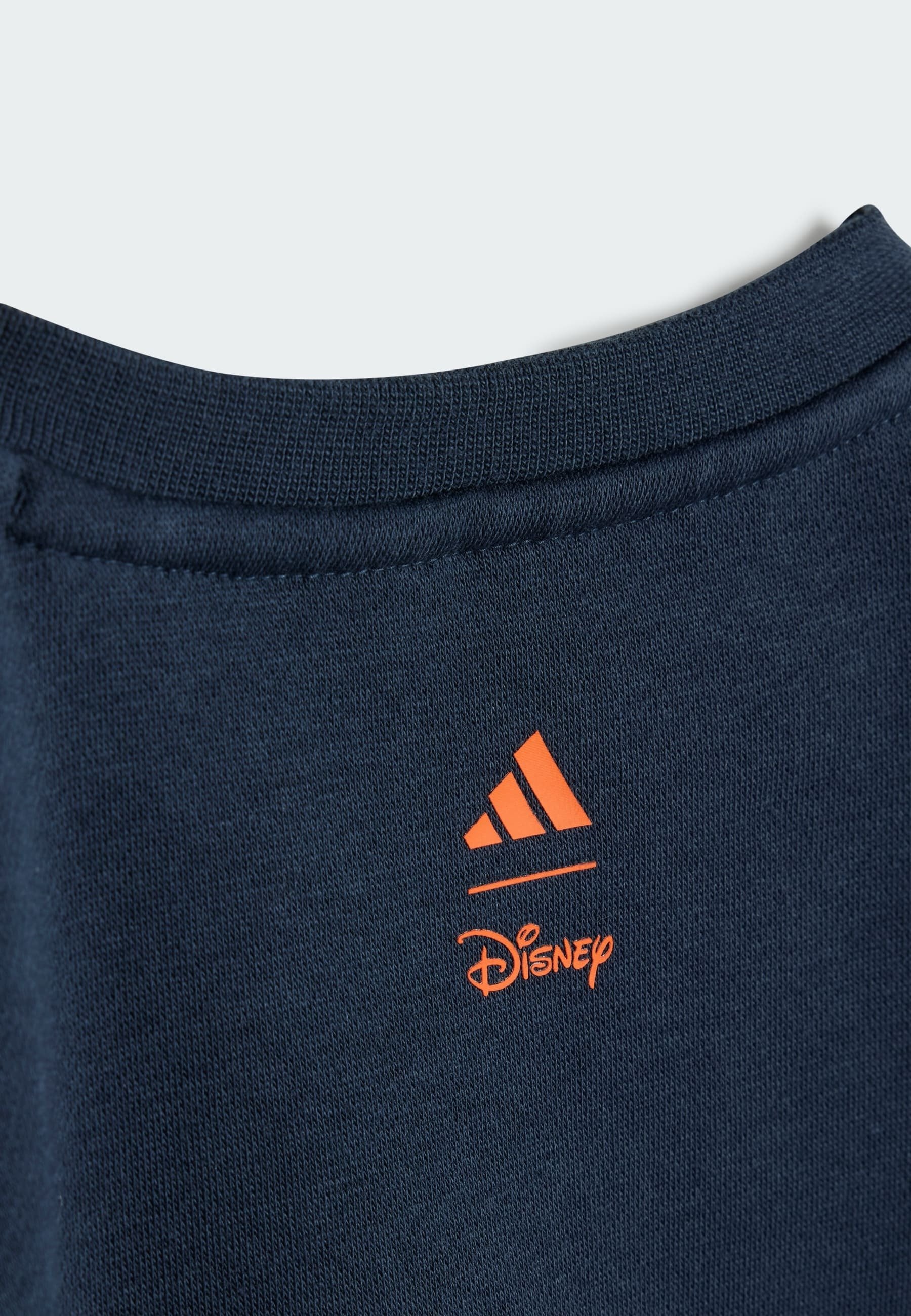 adidas Performance DISNEY MICKEY MOUSE UNISEX SET - Trainingsanzug - Aurora Ink Impact Orange