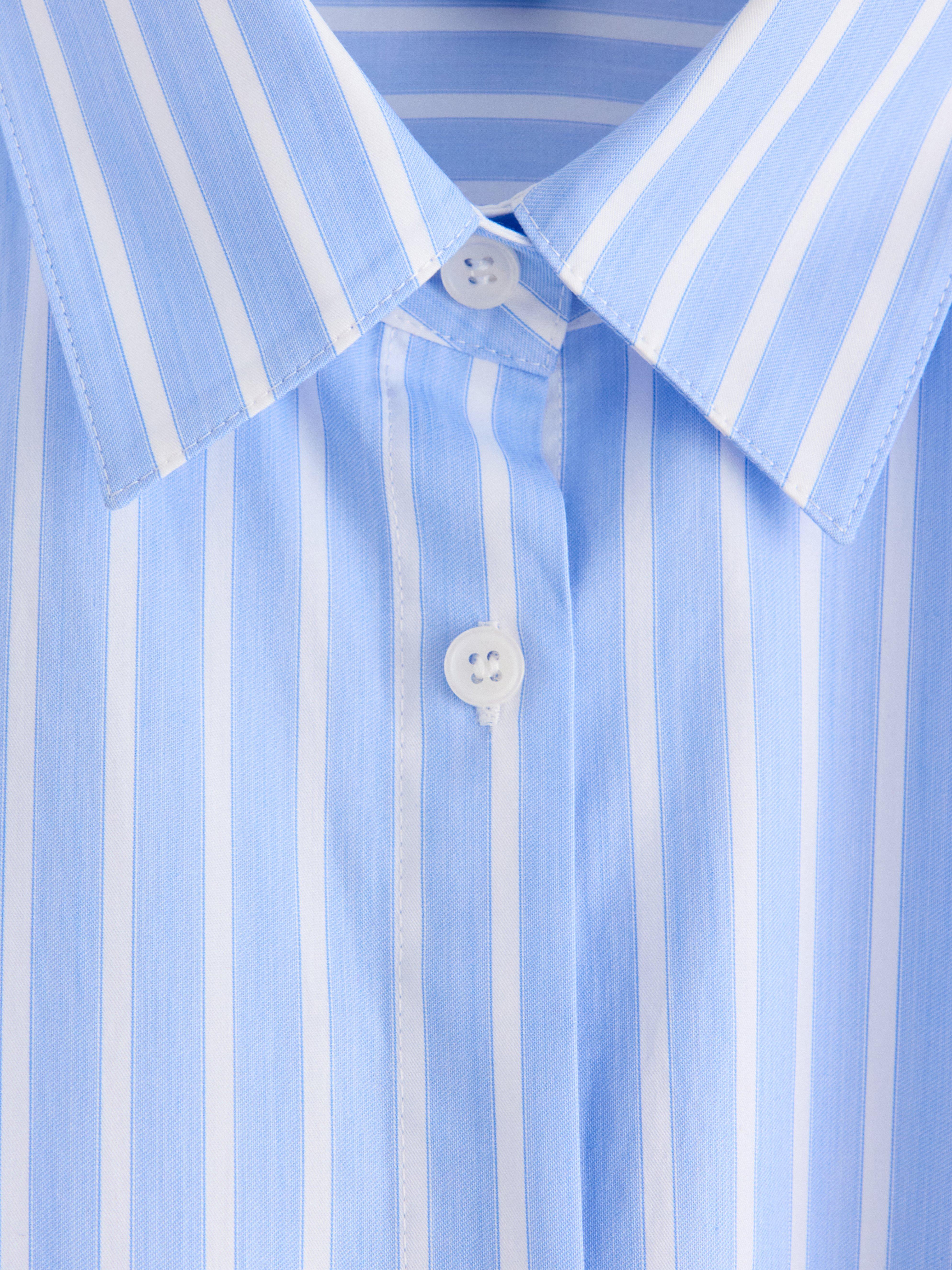 Camisa comprida azul claro