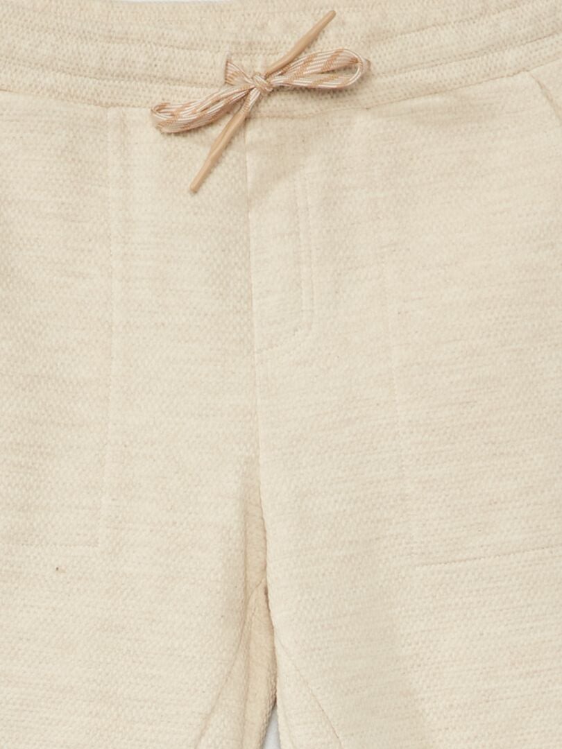 Joggingbroek van katoenpiqué - lossere pasvorm - beige