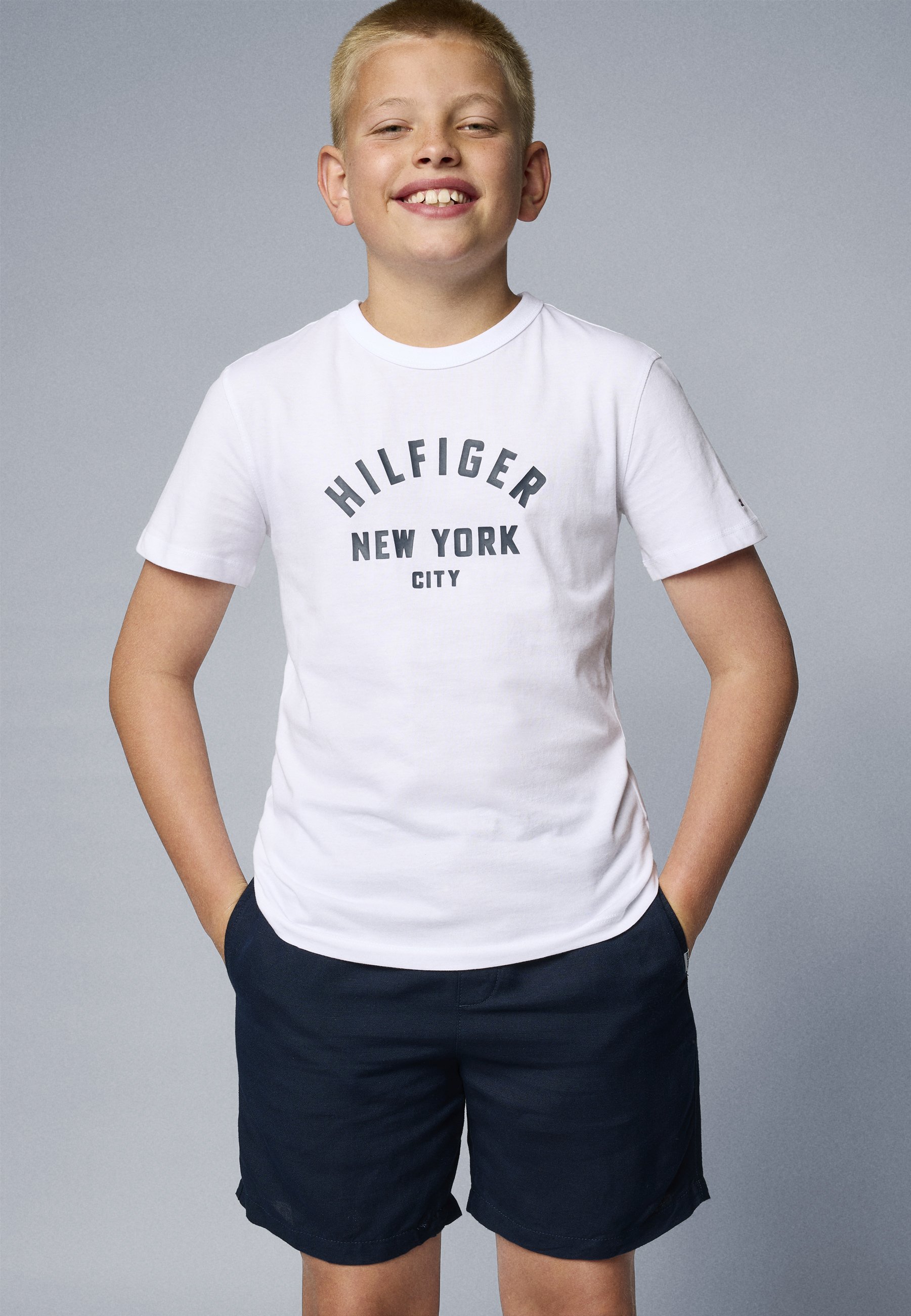 Tommy Hilfiger T-shirt met gebogen print, unisex - T-shirt met print - wit