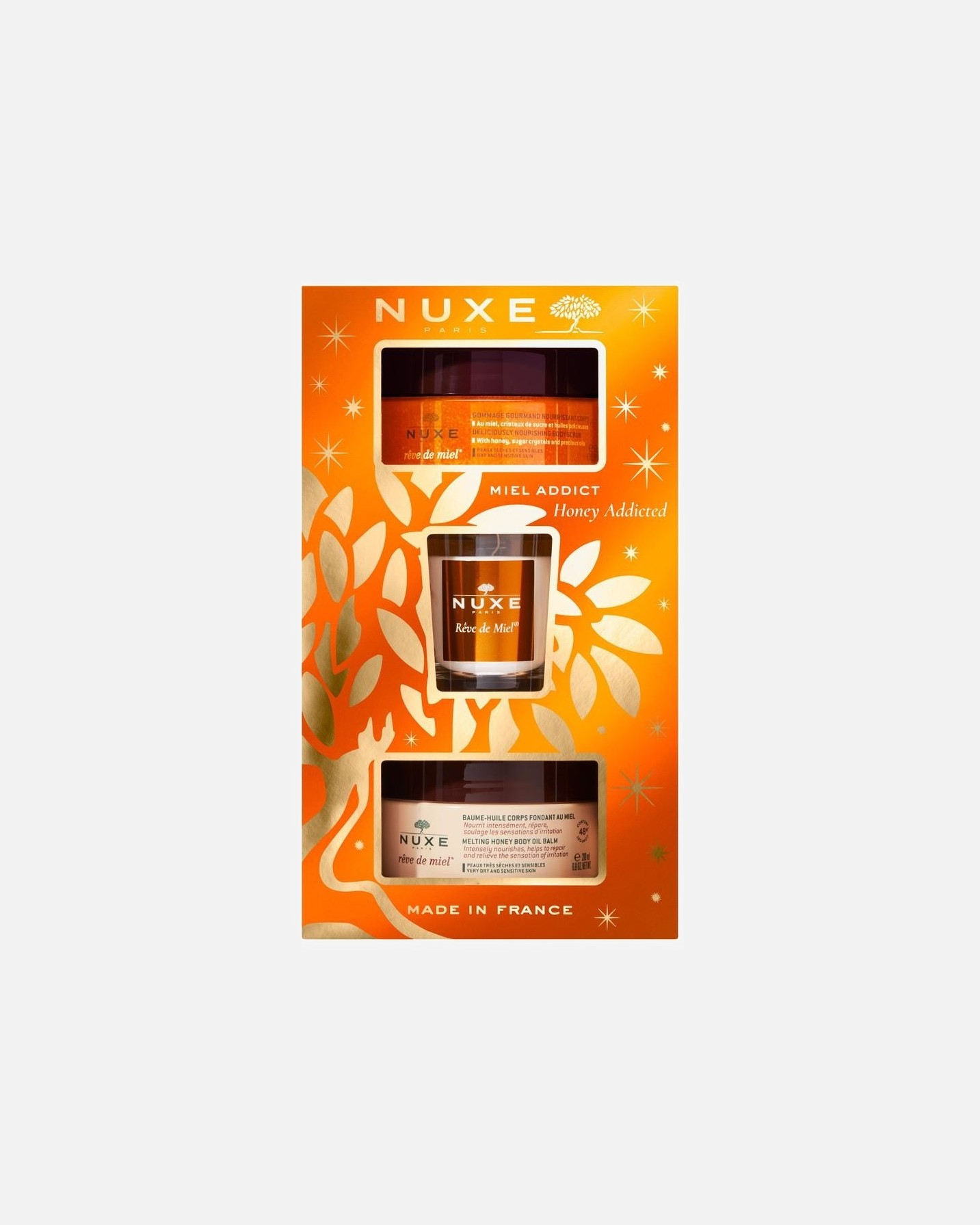 NUXE ķermeņa kopšanas komplekts Nuxe Rêve de Miel® dāvanu komplekts - Atklāj savu mīlestību pret medu - ķermeņa skrubis 175 ml + ķermeņa balzams 200 ml + svece 70 g 1 gab.