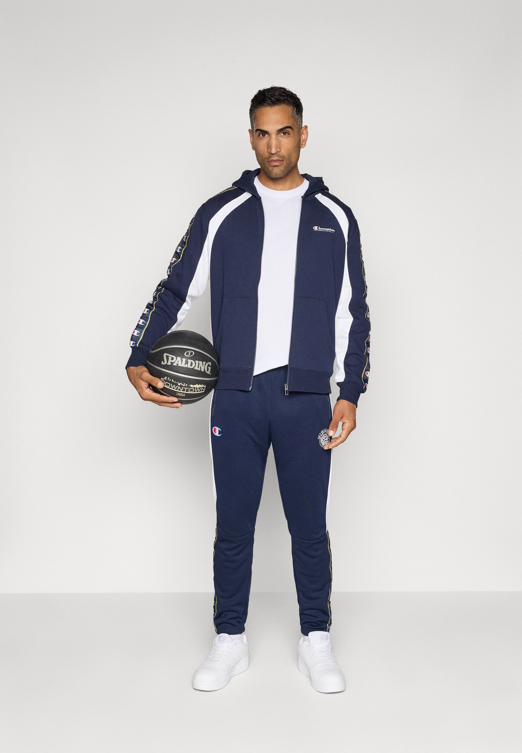 Pantalon de survêtement Champion SPORT HERITAGE à poignets élastiques - Bleu foncé