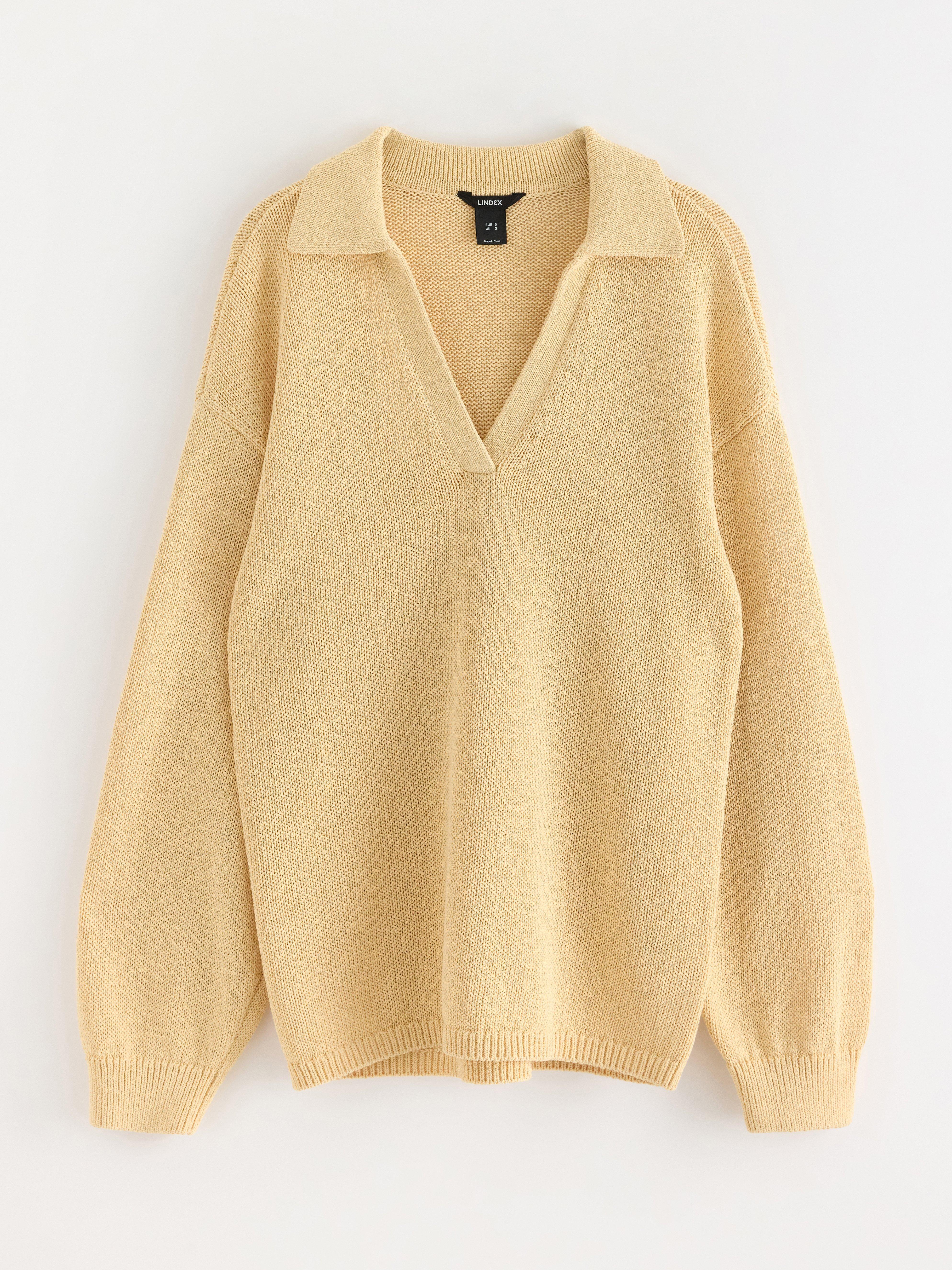 Suéter de tricô amarelo