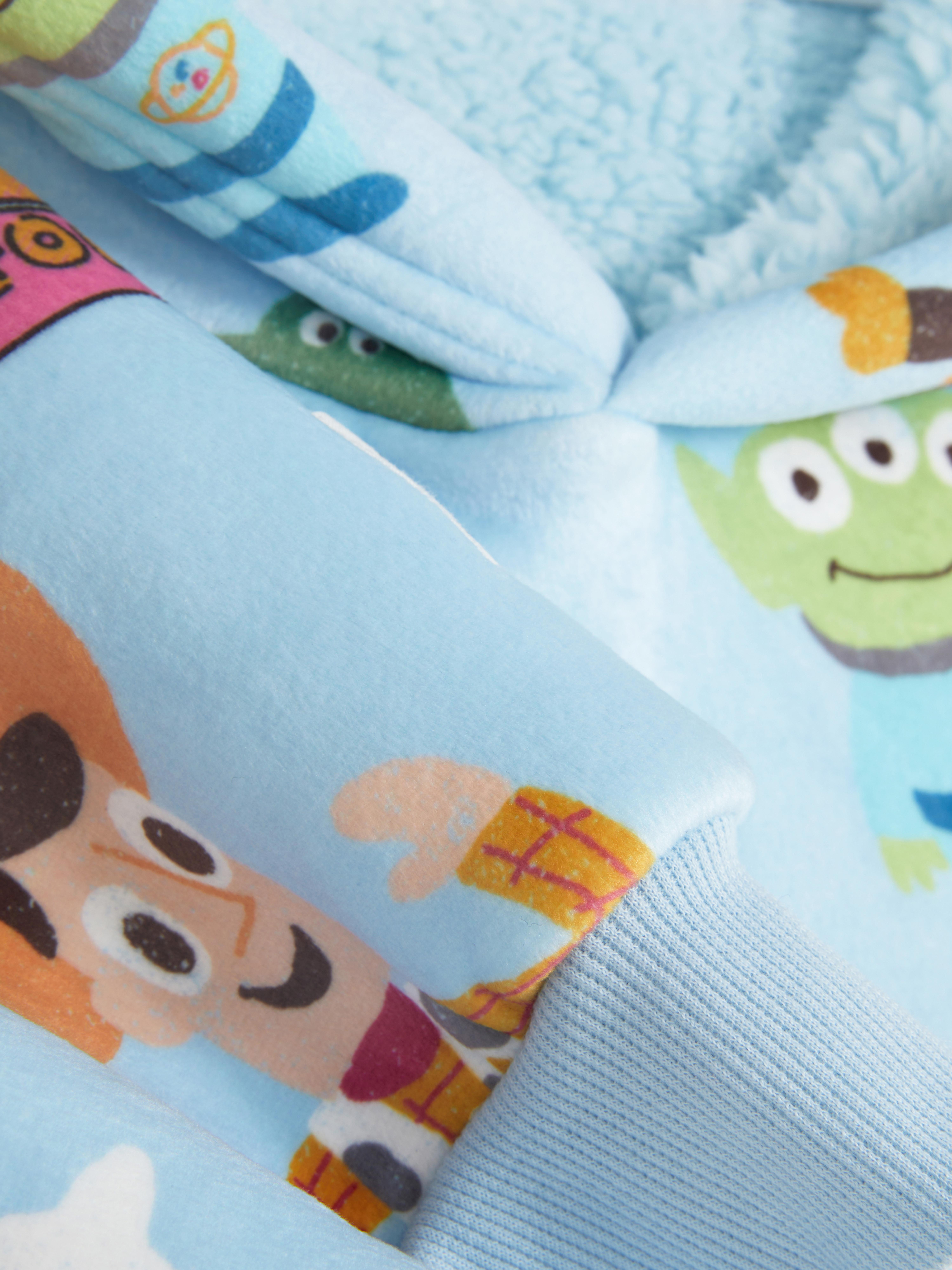 Snuddie Disney Toy Story Alege ținute casual serioase în acest snuddie confortabil Disney Toy Story