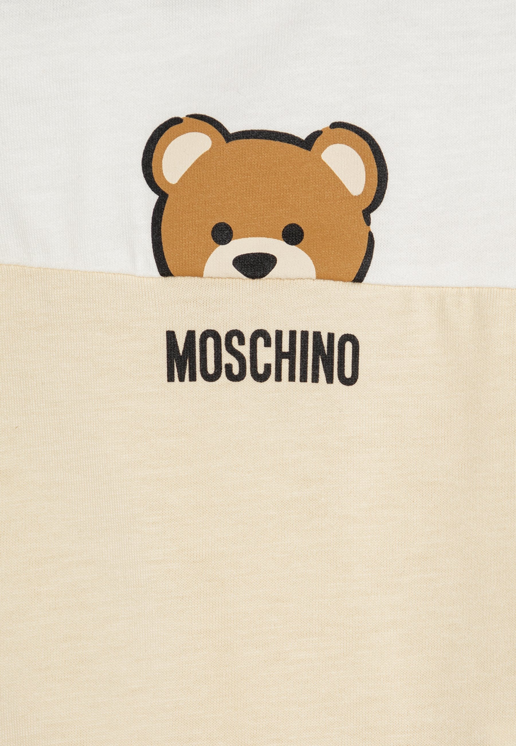 Conjunto unissex Moschino com macacão e gorro - Bege