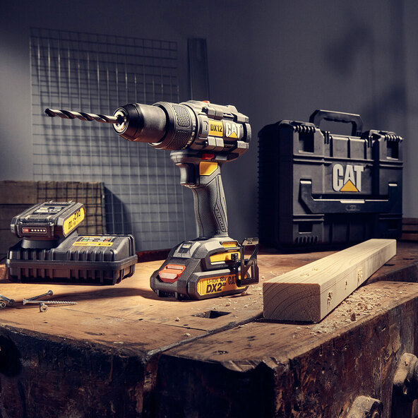 18V slagbormaskin, 65 Nm, DX12.3 inkl. 2 batterier og lader