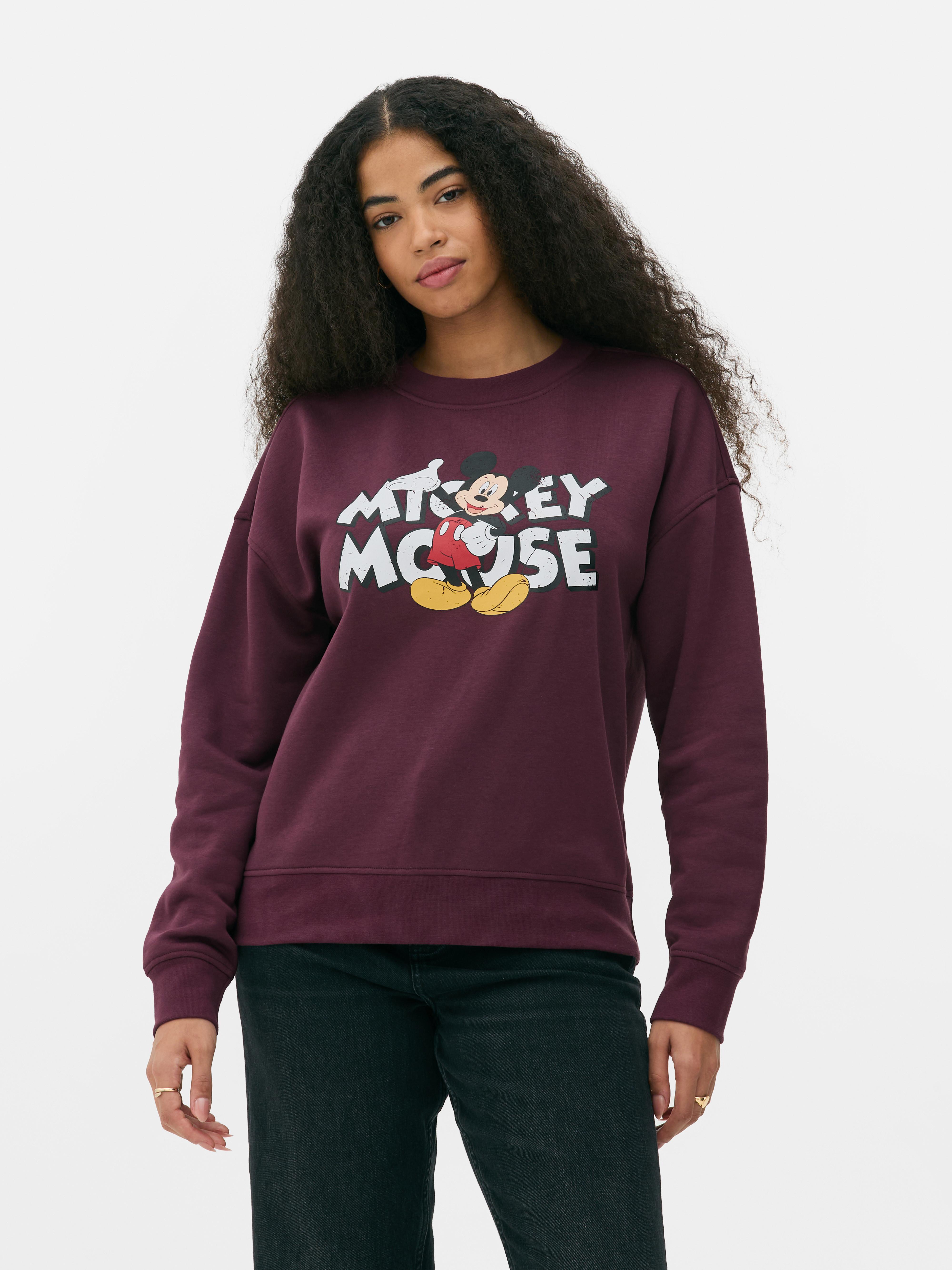 Disney Mickey egér mintás pulóver Egy Disney Mickey egér mintás pulóver kerek nyakkal és hosszú ujjakkal