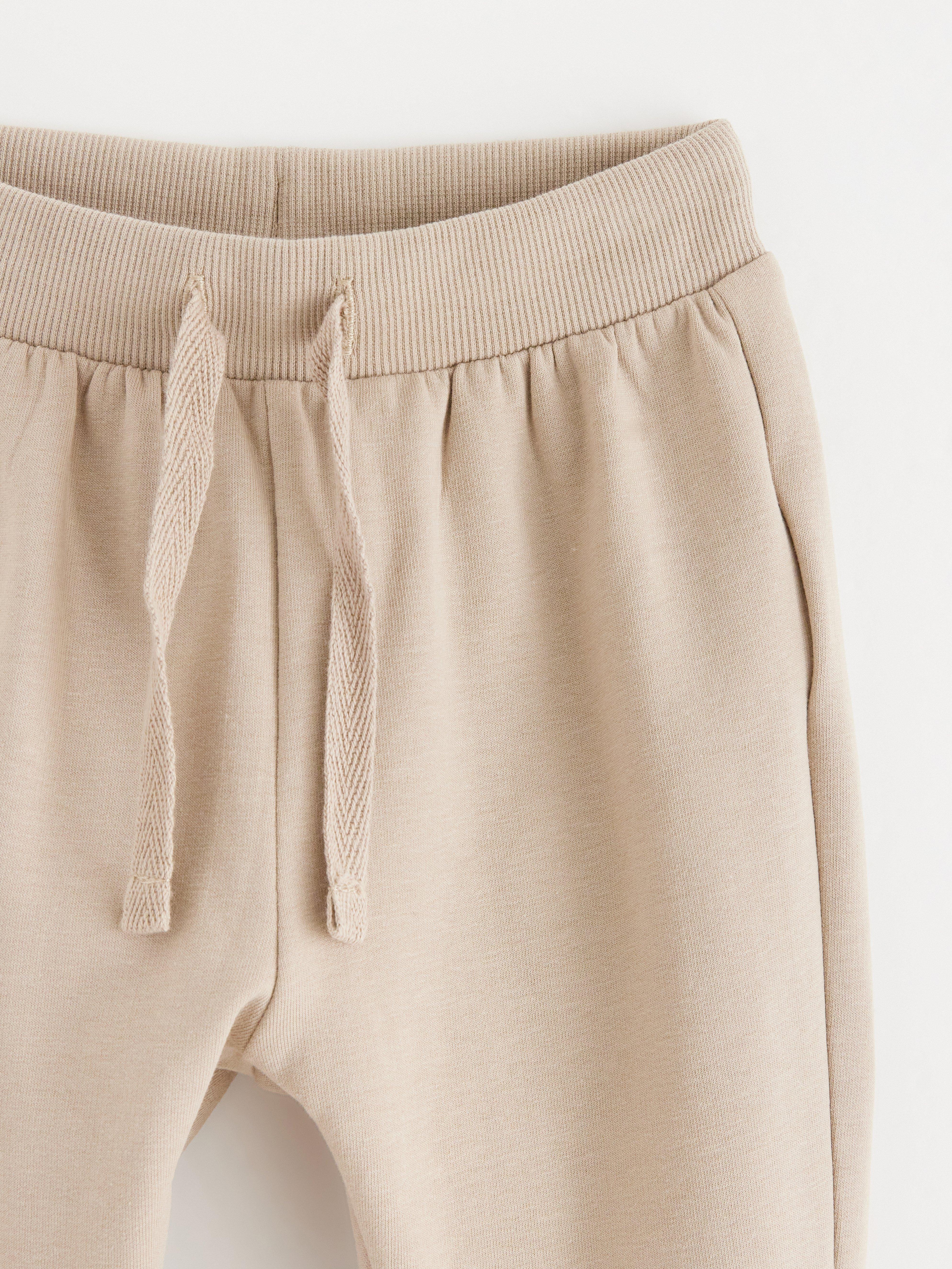 Pantalon de survêtement beige délavé à l'intérieur brossé