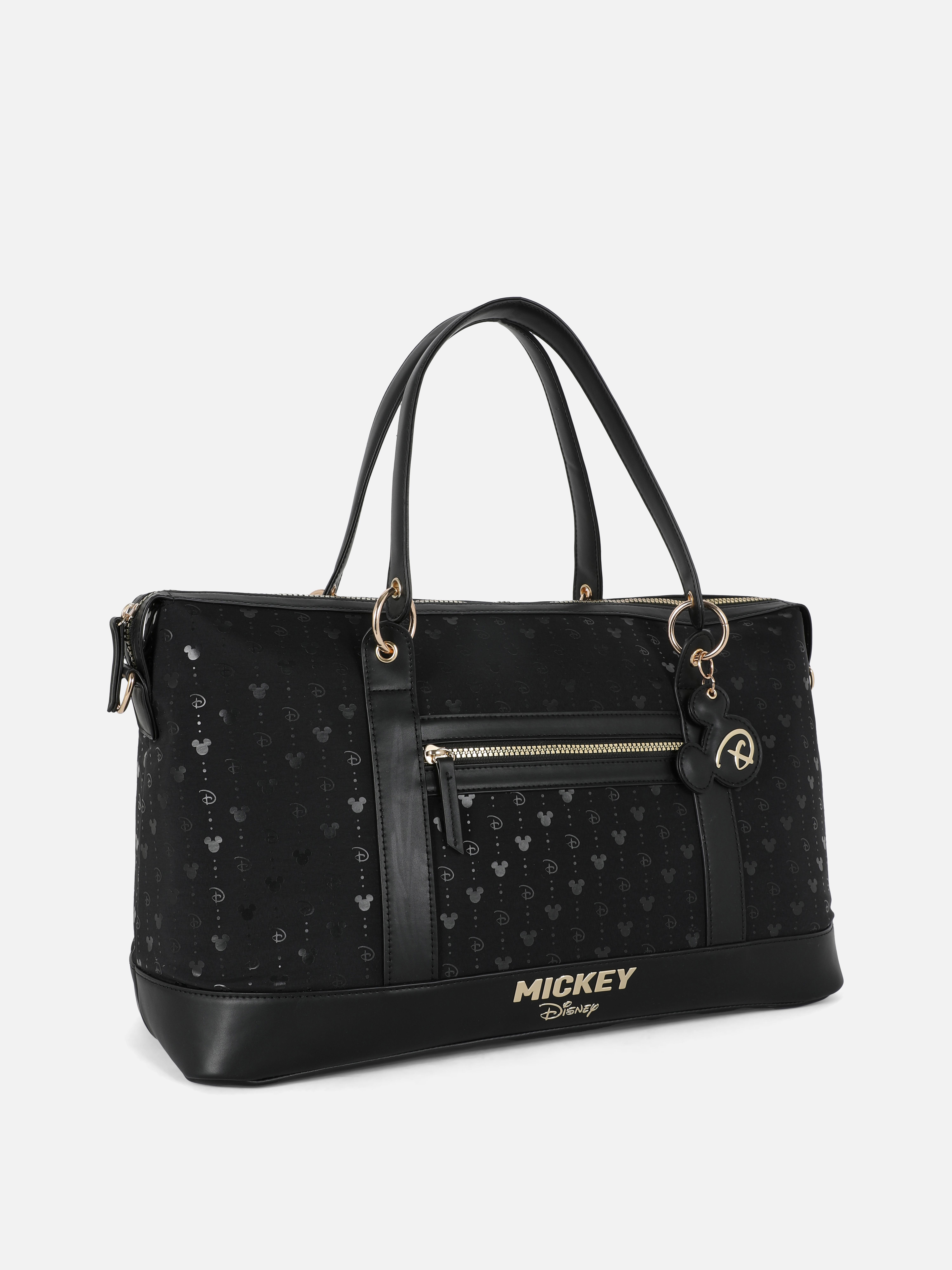 Wochenendtasche mit Disney-Mickey-Mouse-Monogramm. Disney-Mickey-Mouse-Wochenendtasche mit viel Stauraum und Monogramm.