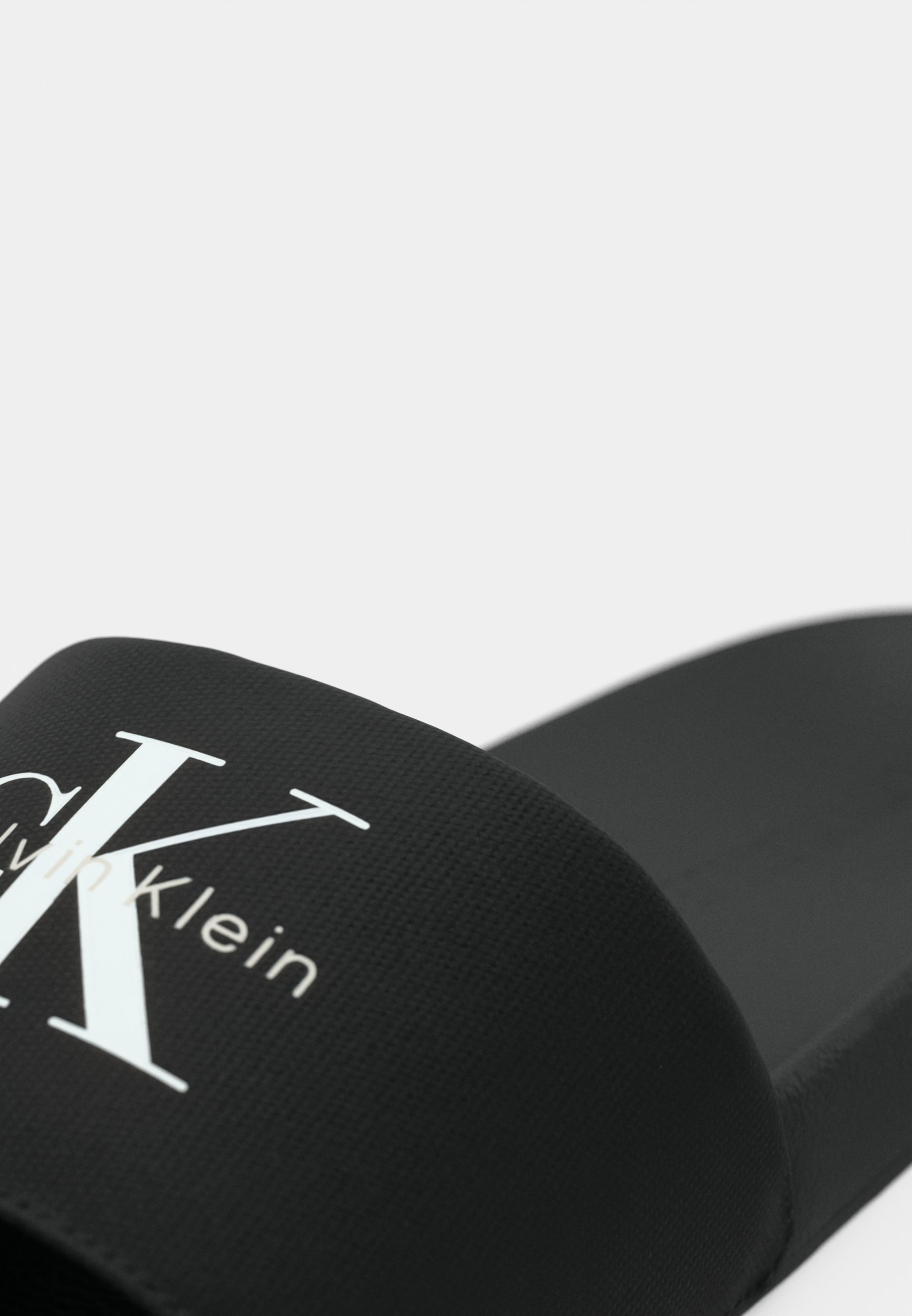 Calvin Klein Jeans SLIDE MONOLOGO - Mules - triple noir