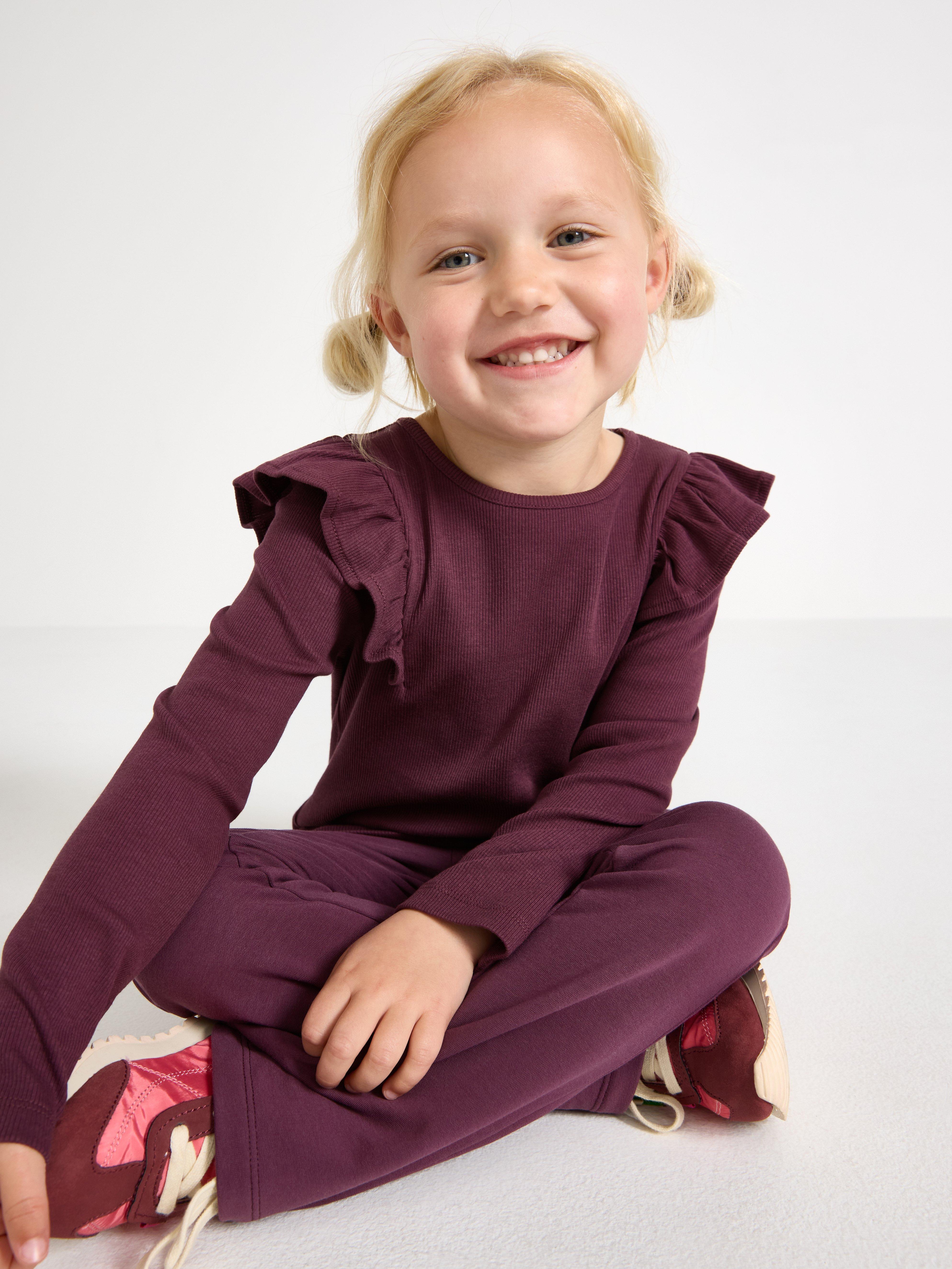 Top de manga larga color lila oscuro empolvado
