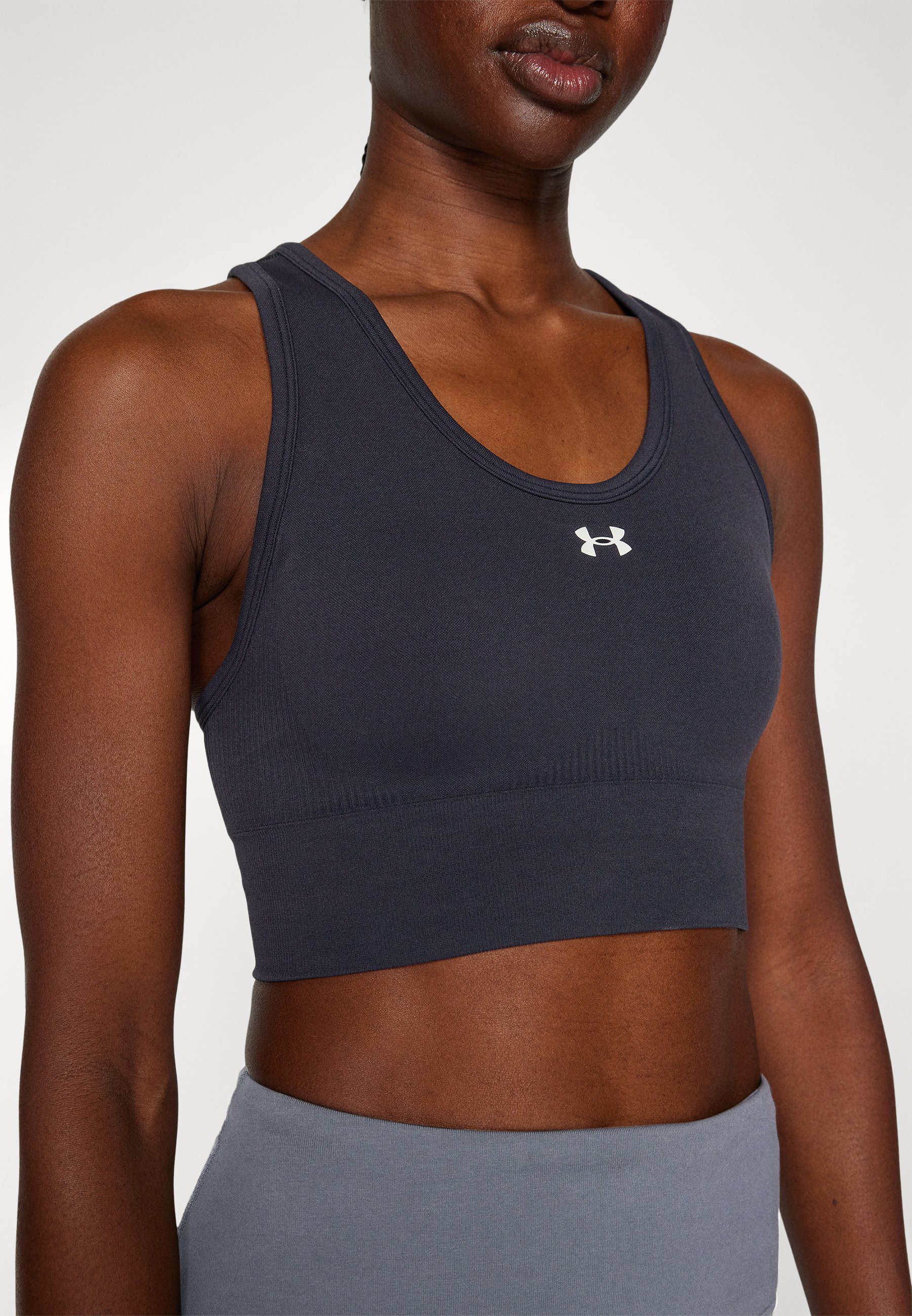 Reggiseno sportivo Under Armour VANISH SEAMLESS MID - Supporto medio - nero/bianco