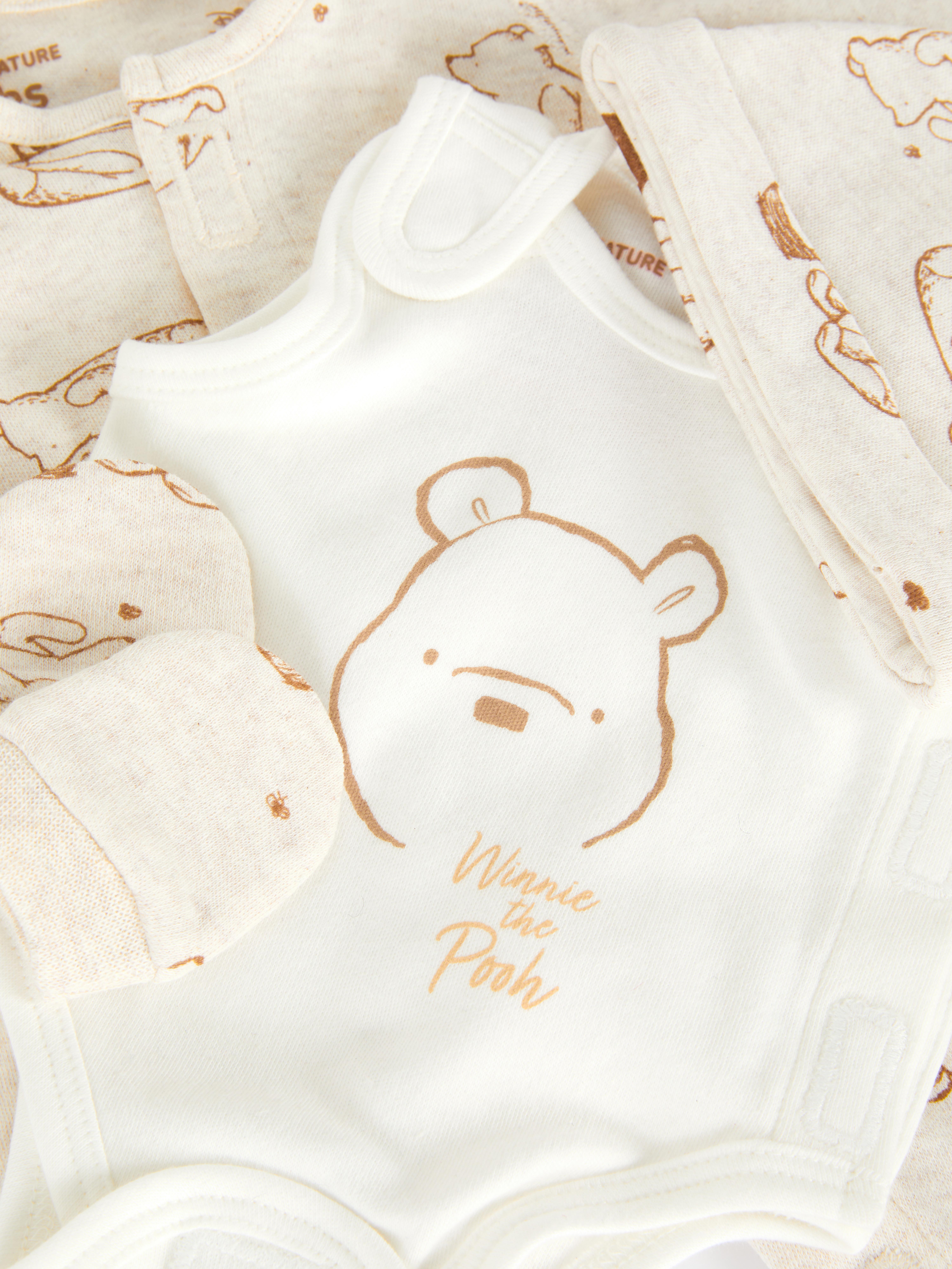 Set de început Disney Winnie the Pooh pentru bebeluși prematuri. Acest set de început cu patru piese este perfect pentru bebelușii prematuri.