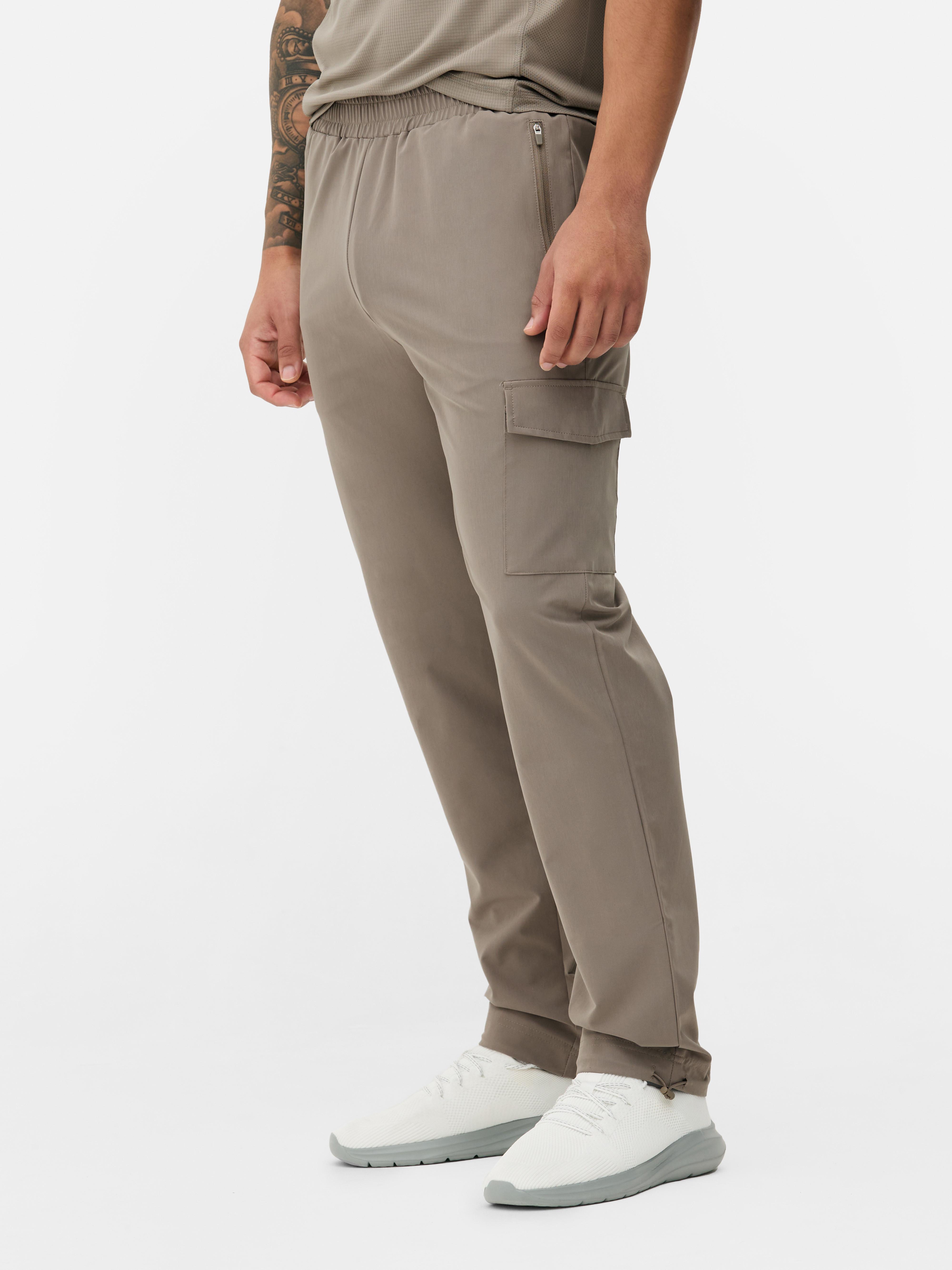 Woven cargo sweatpants Woven sweatpants with stretchy waist, cargo pockets and adjustable ankle cuffs