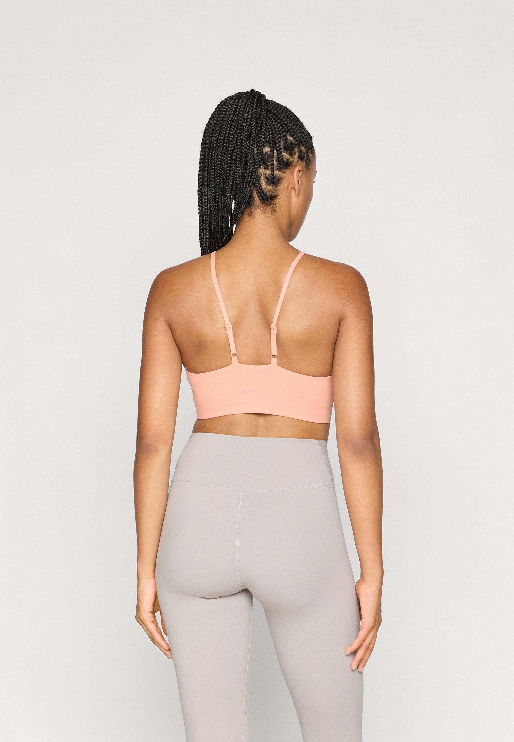 Nike Performance KEYHOLE BRA - Sportbeha met lichte ondersteuning - abrikoos agaat