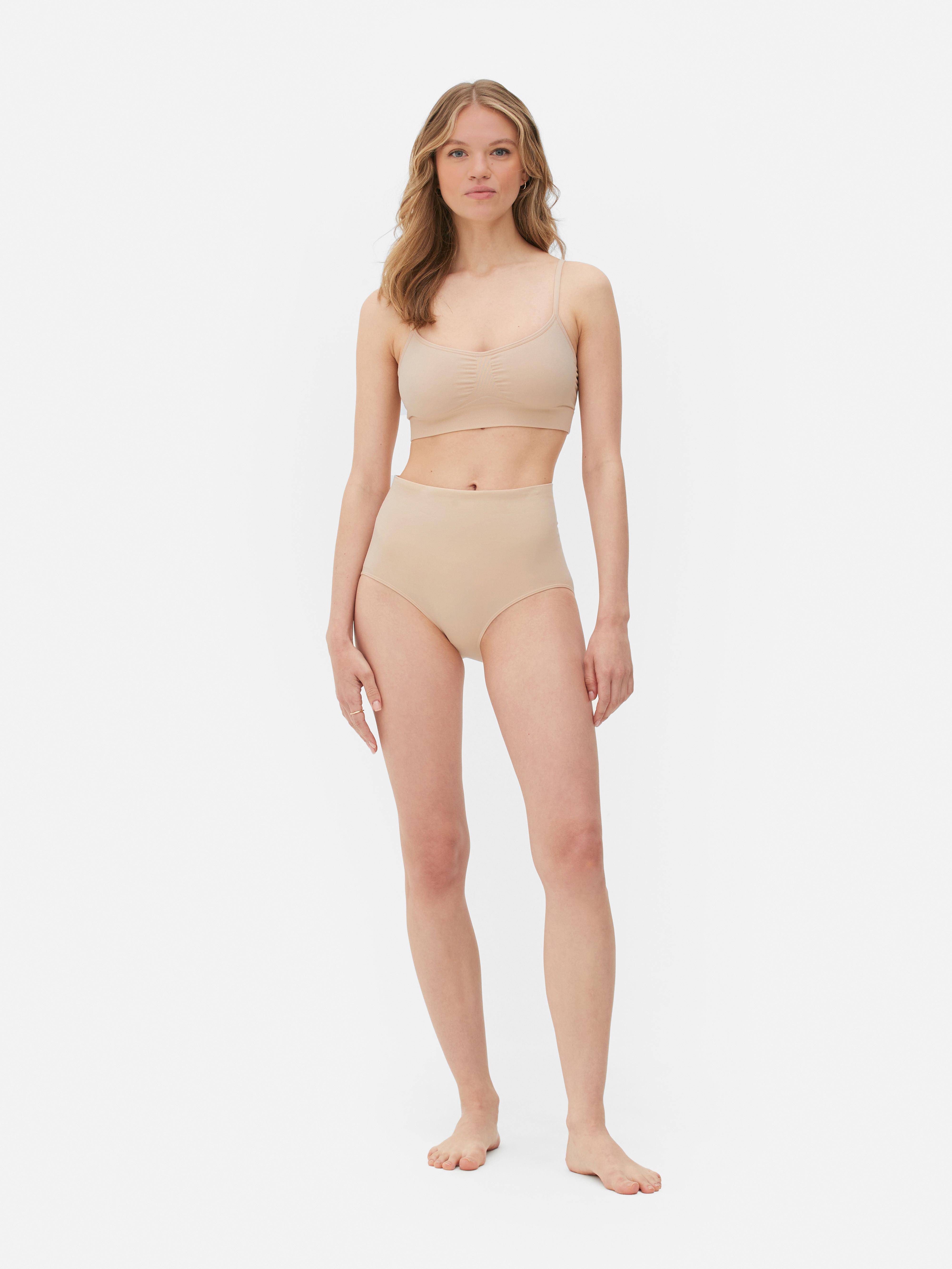 Slip modellanti a vita alta senza cuciture. Crea una silhouette impeccabile con questi slip modellanti a vita medio-alta.