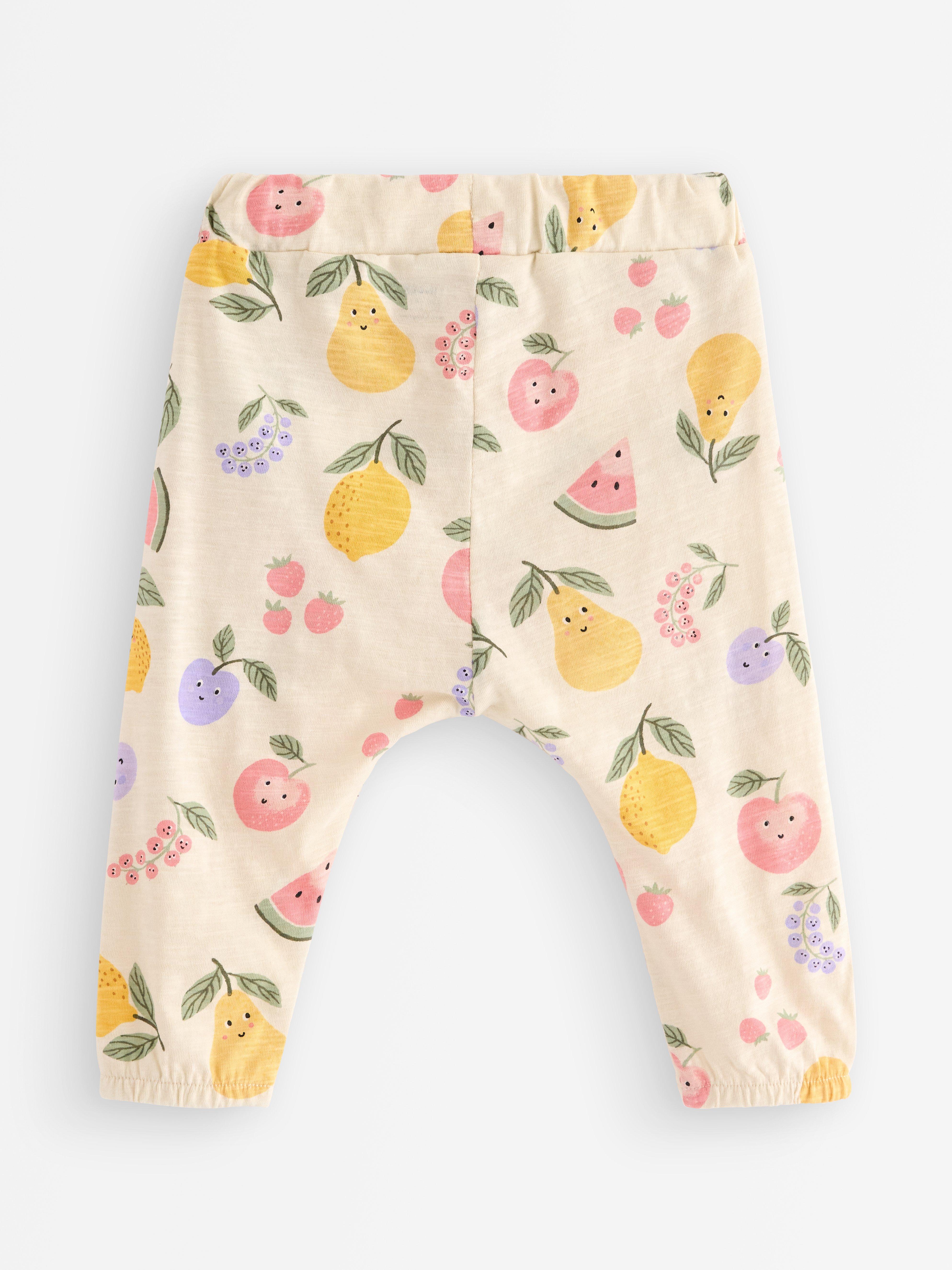 Calça de moletom em malha texturizada bege claro