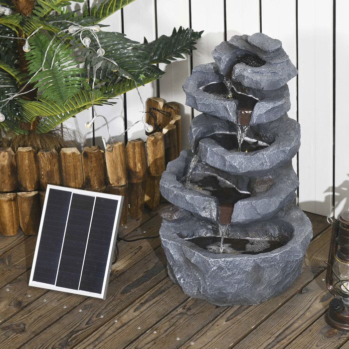 Fuente de jardín Outsunny de 5 niveles con cascada de roca, alimentada por energía solar, fabricada en resina con luces LED y bomba, color gris.