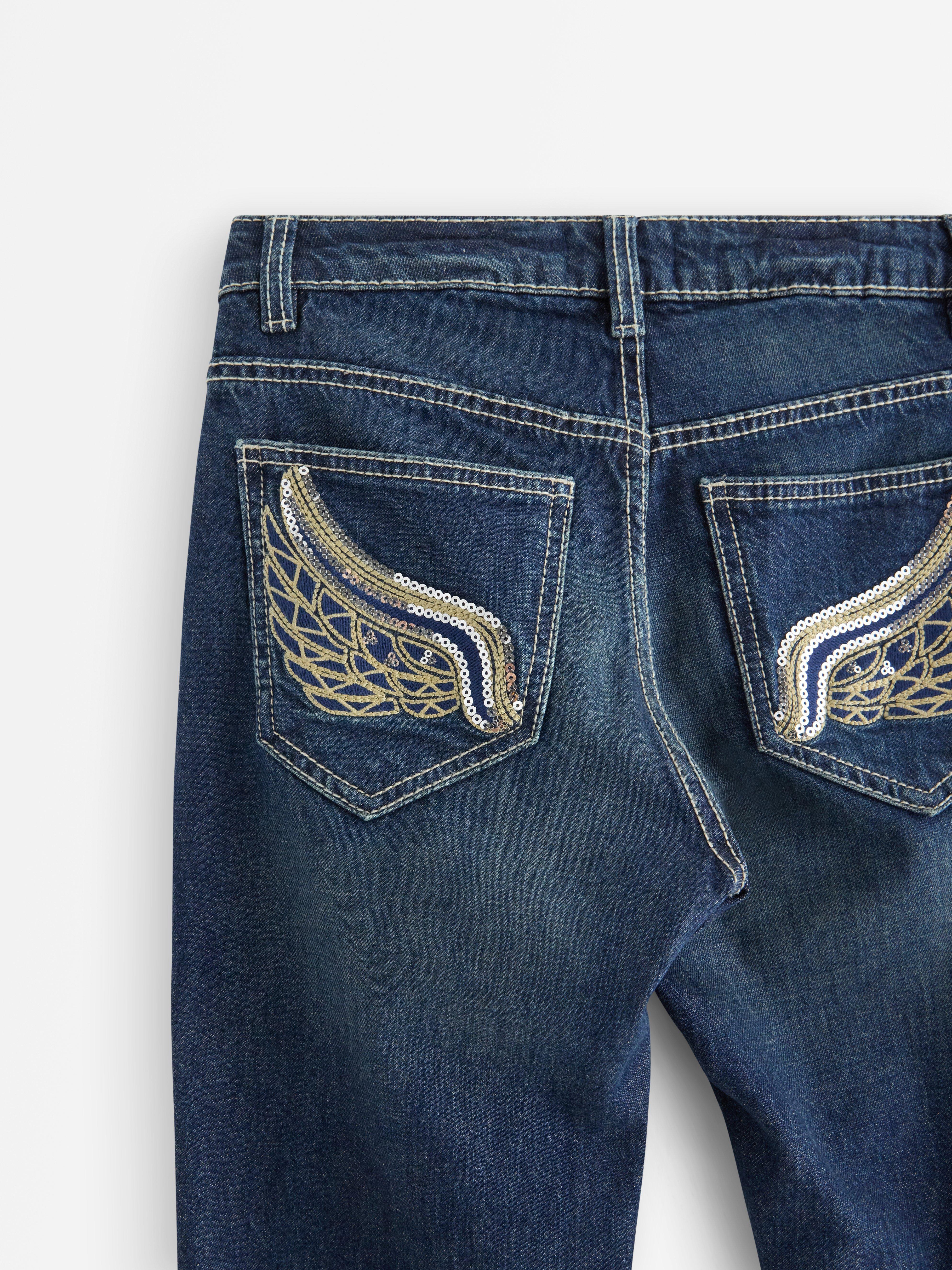 Vaqueros FREJA de pierna ancha con bolsillos traseros decorados. Denim oscuro.