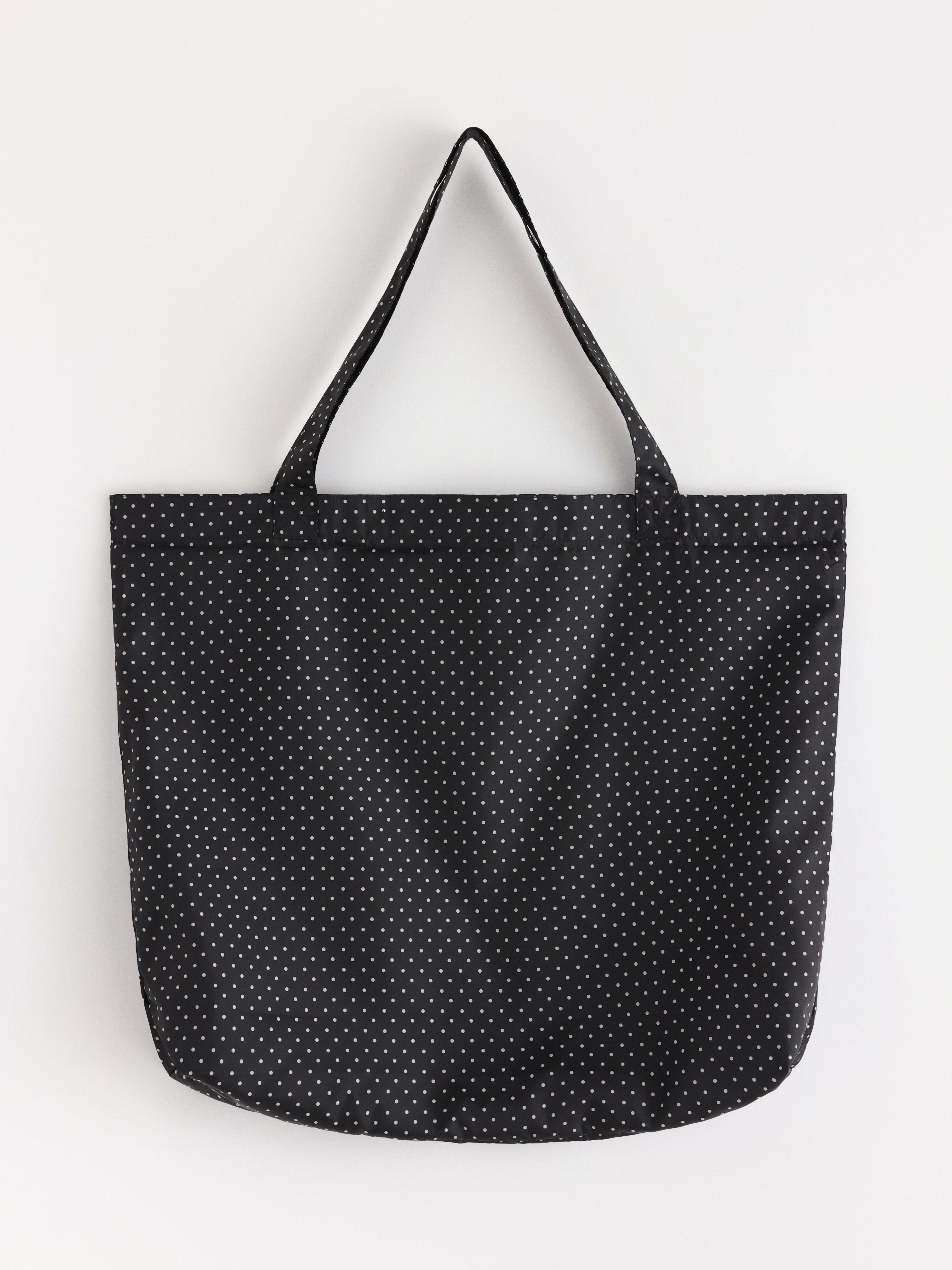 Bolsa de compras plegable, color blanco claro.