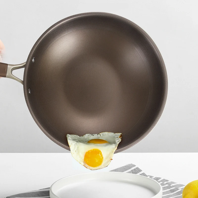 Poêle à frire en acier inoxydable titane, antiadhésive, sans revêtement, compatible avec les plaques à induction et les cuisinières à gaz.