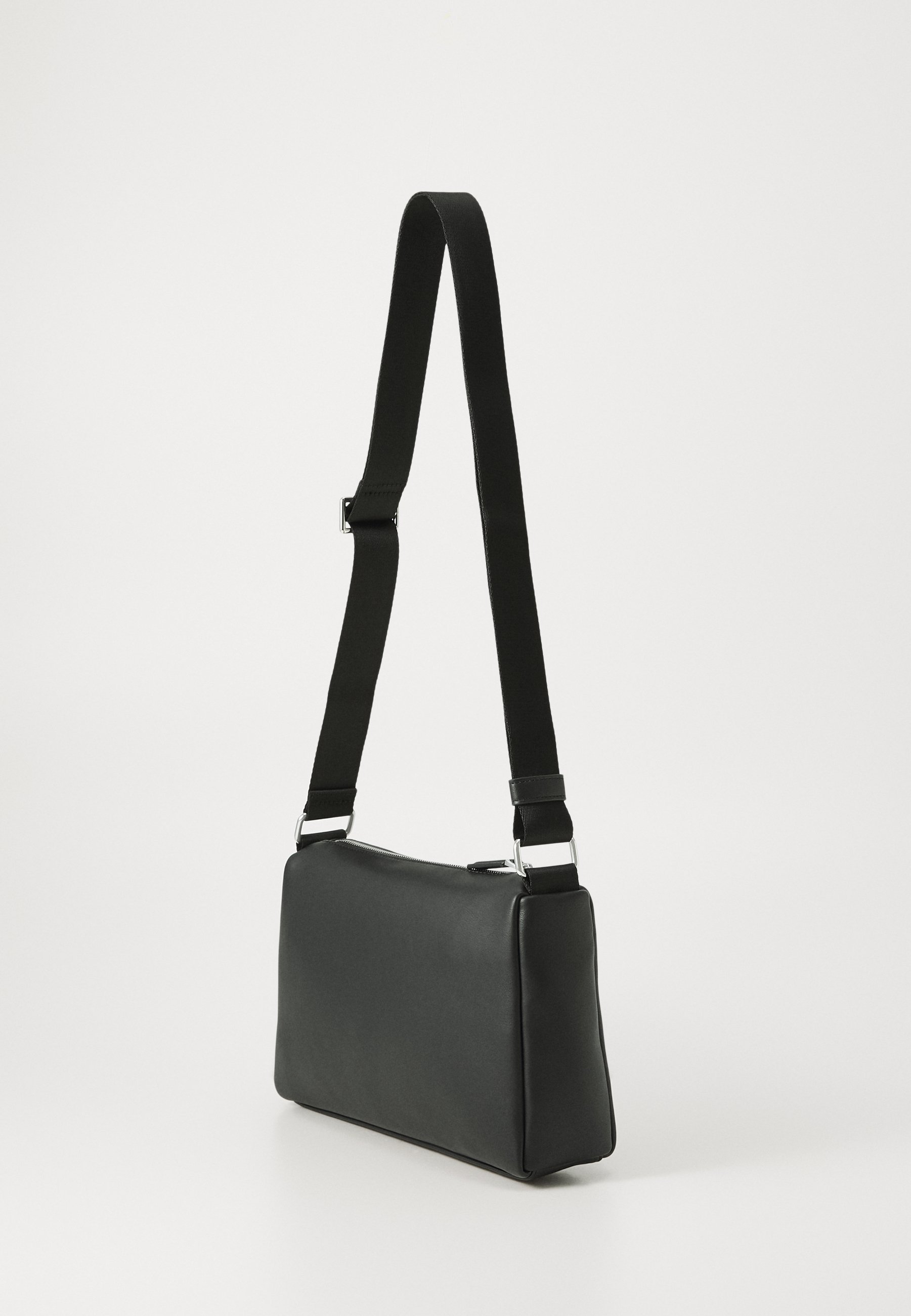 Tommy Hilfiger RELAXED CROSSOVER UNISEX - Crossbodytas - zwart