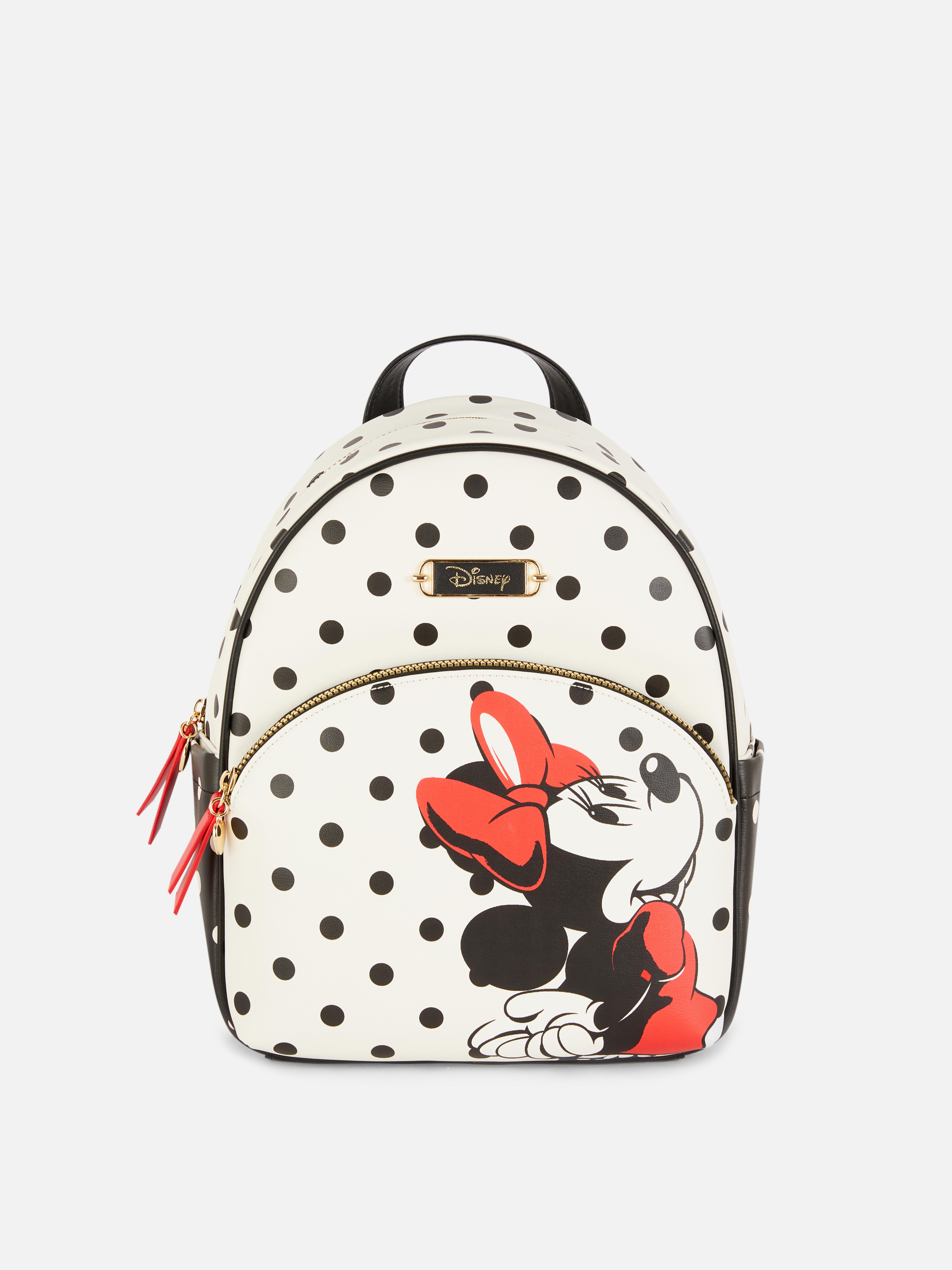 Disney Minnie Mouse Polka Dot Rucksack: Ein Rucksack aus Kunstleder mit Vordertasche, verstellbaren Schultergurten und Reißverschluss oben.
