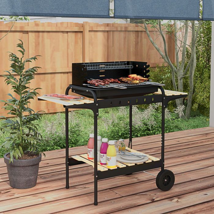 Barbecue a carbone con supporto e griglia regolabile.