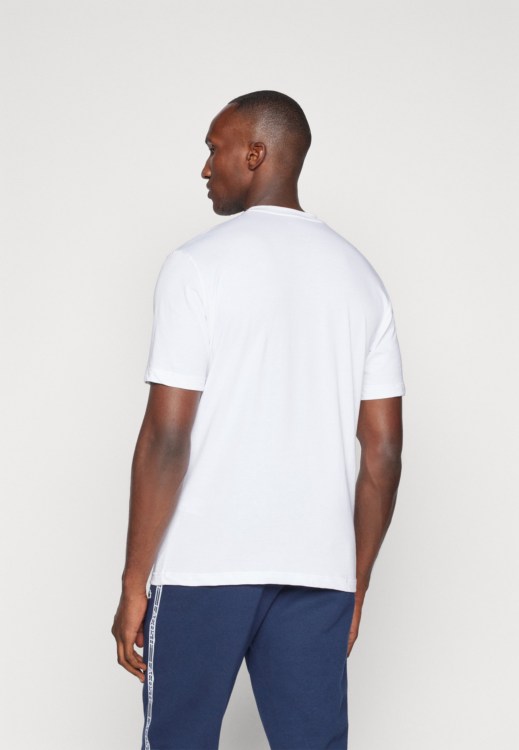 Lacoste Sport CLASSIC - T-shirt sportiva - bianca