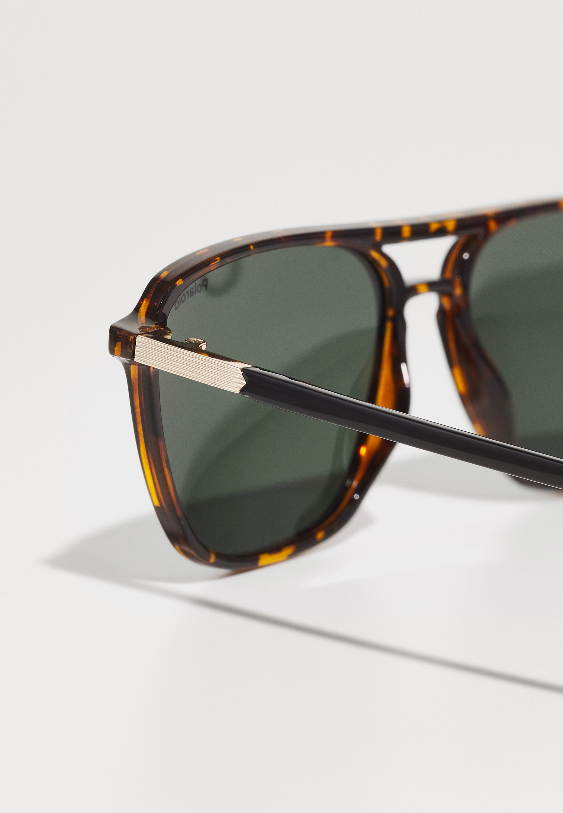 Polaroid Sonnenbrille - Havanna