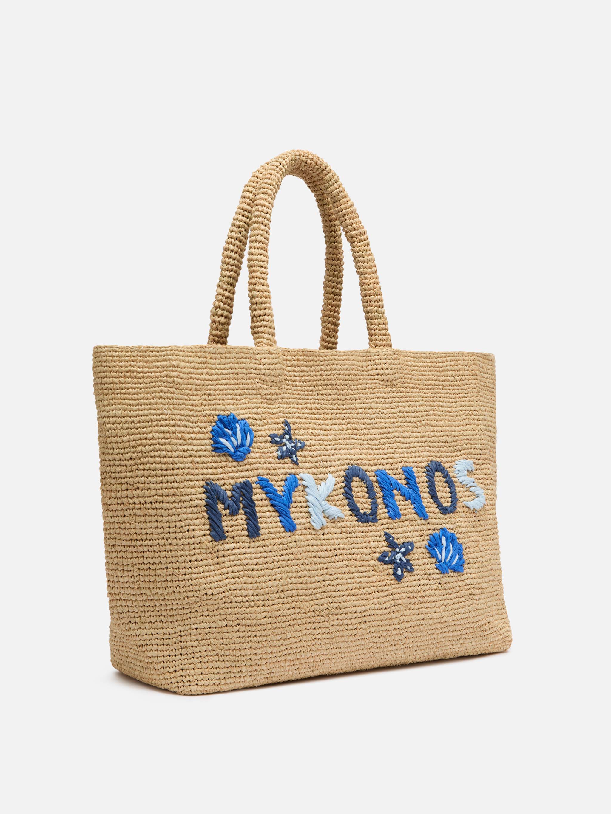 Beige raffia strandtas met katoenen binnenvak en Mykonos-borduurwerk.