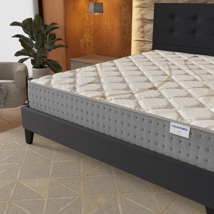 Colchón y cama (140x190cm) - Muelles ensacados Essem de 25cm y espuma de alta densidad + base de láminas estable y cabecero tapizado en negro.
