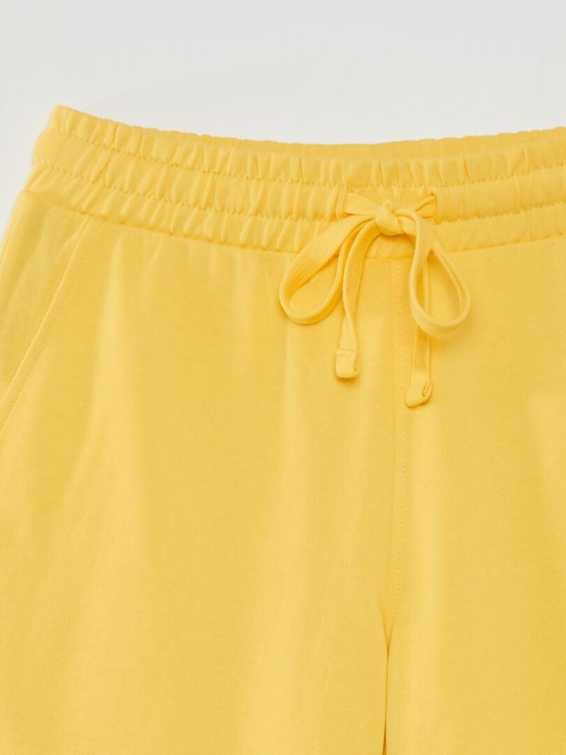 Calções de cor sólida em tecido polar - AMARELO
