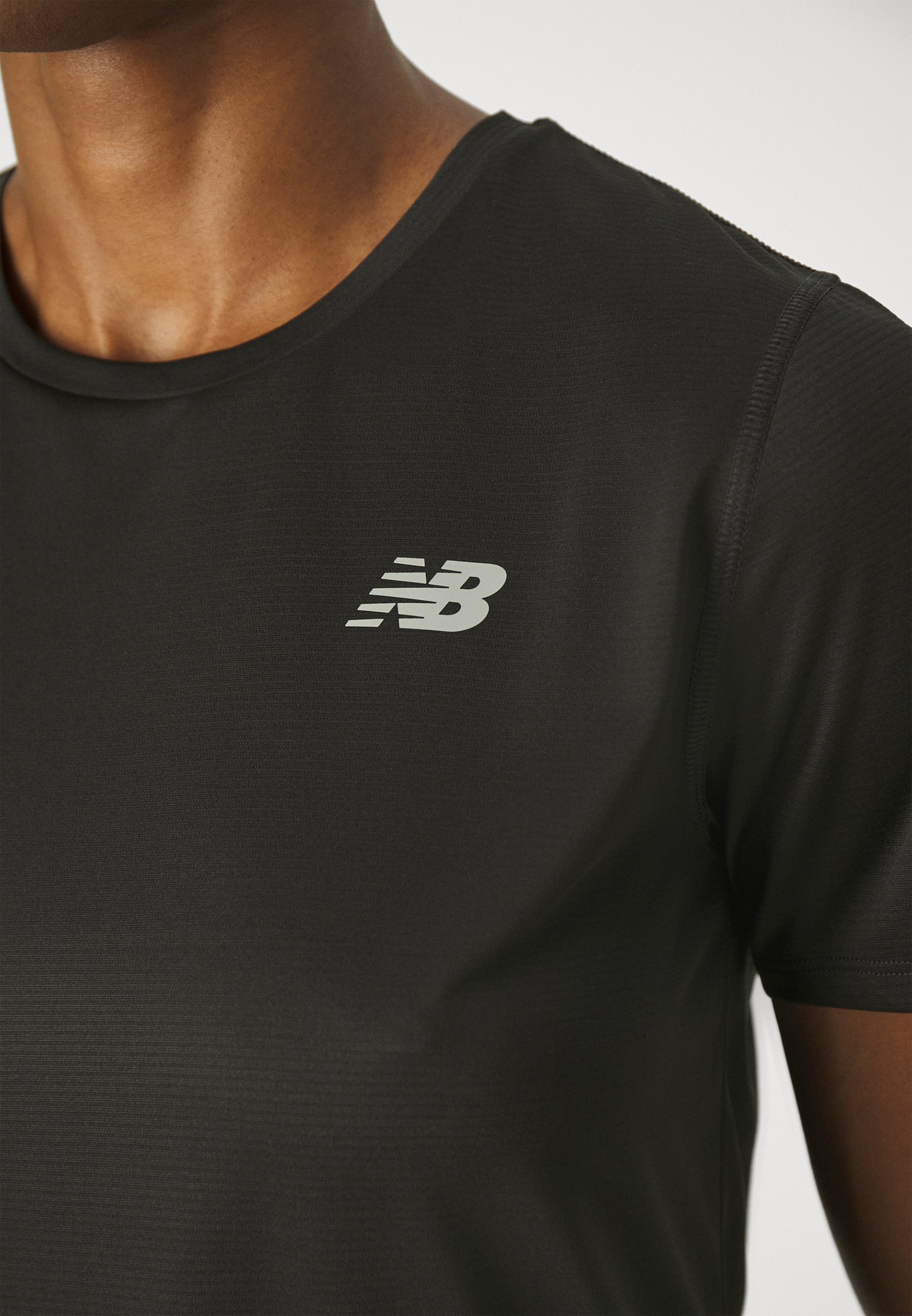 New Balance ESSENTIALS - Tricou sport - negru