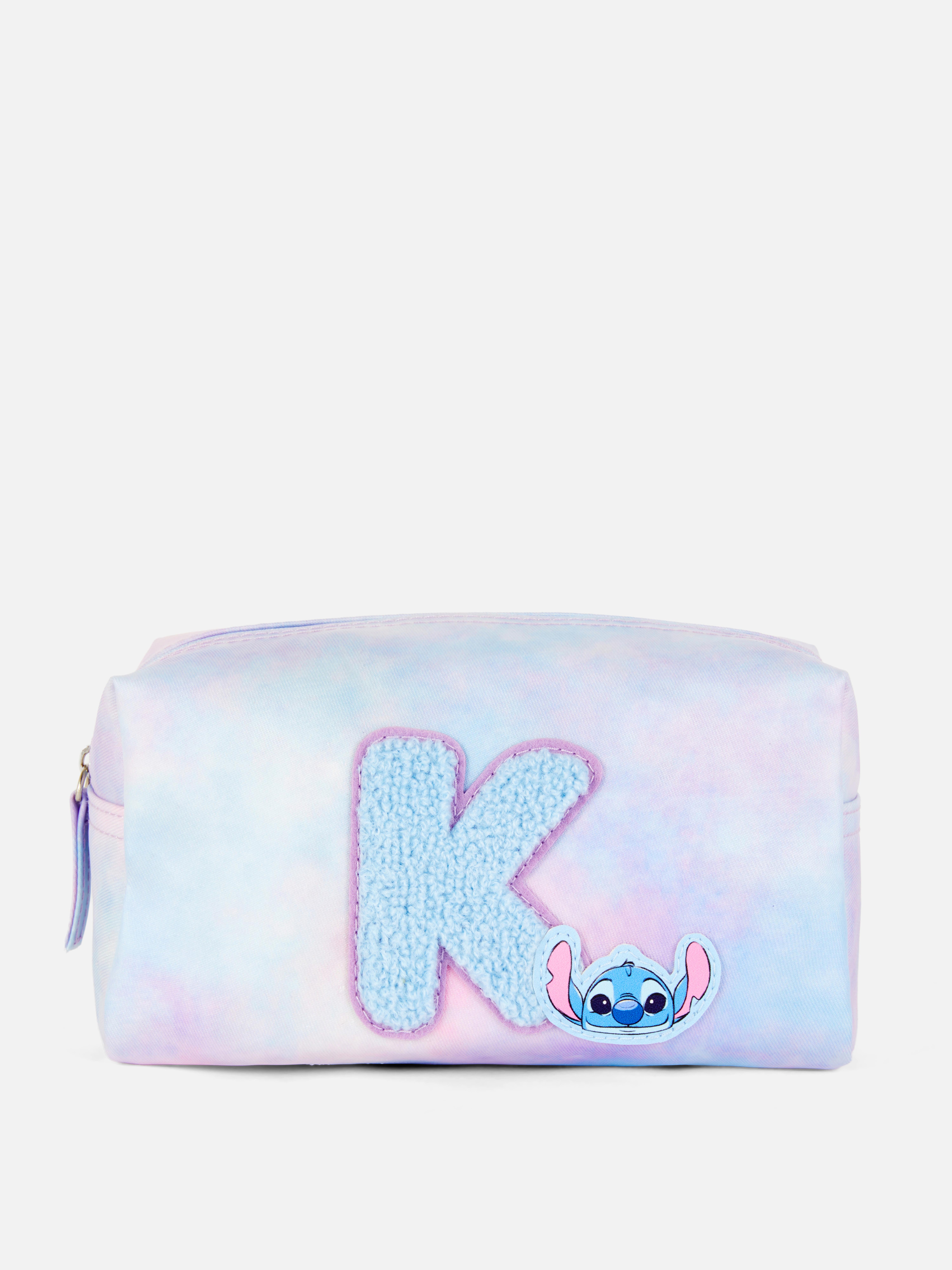 Borsa bouclé con Stitch della Disney. Rendi divertente riporre gli oggetti con la nostra borsa con iniziale e Stitch della Disney.