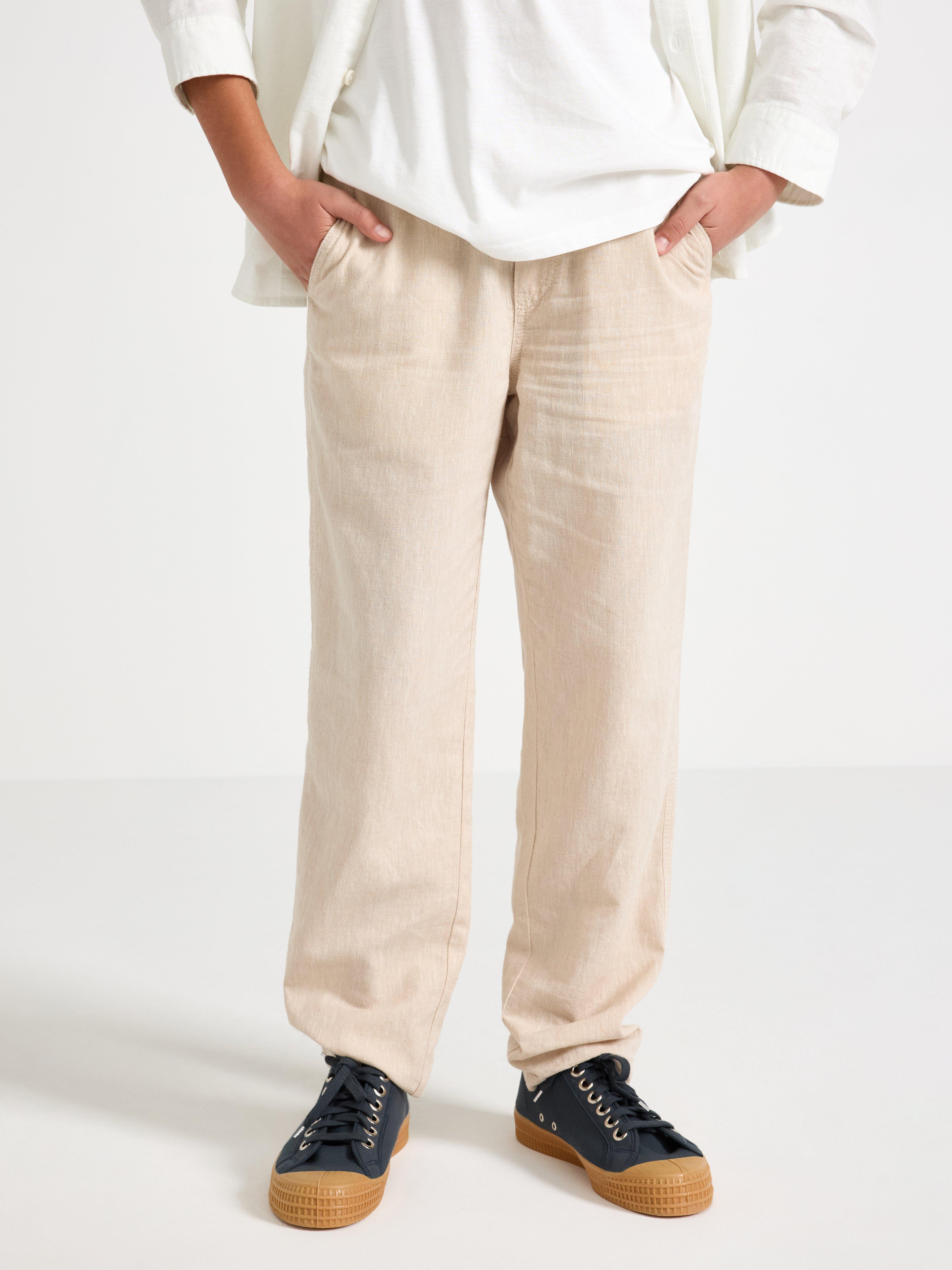 Rovné kalhoty STAFFAN ze směsi lnu béžové barvy